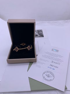 Van Cleef & Arpels Alhambra 5-Motif Bracelet in 18K Gold with Red Carnelian