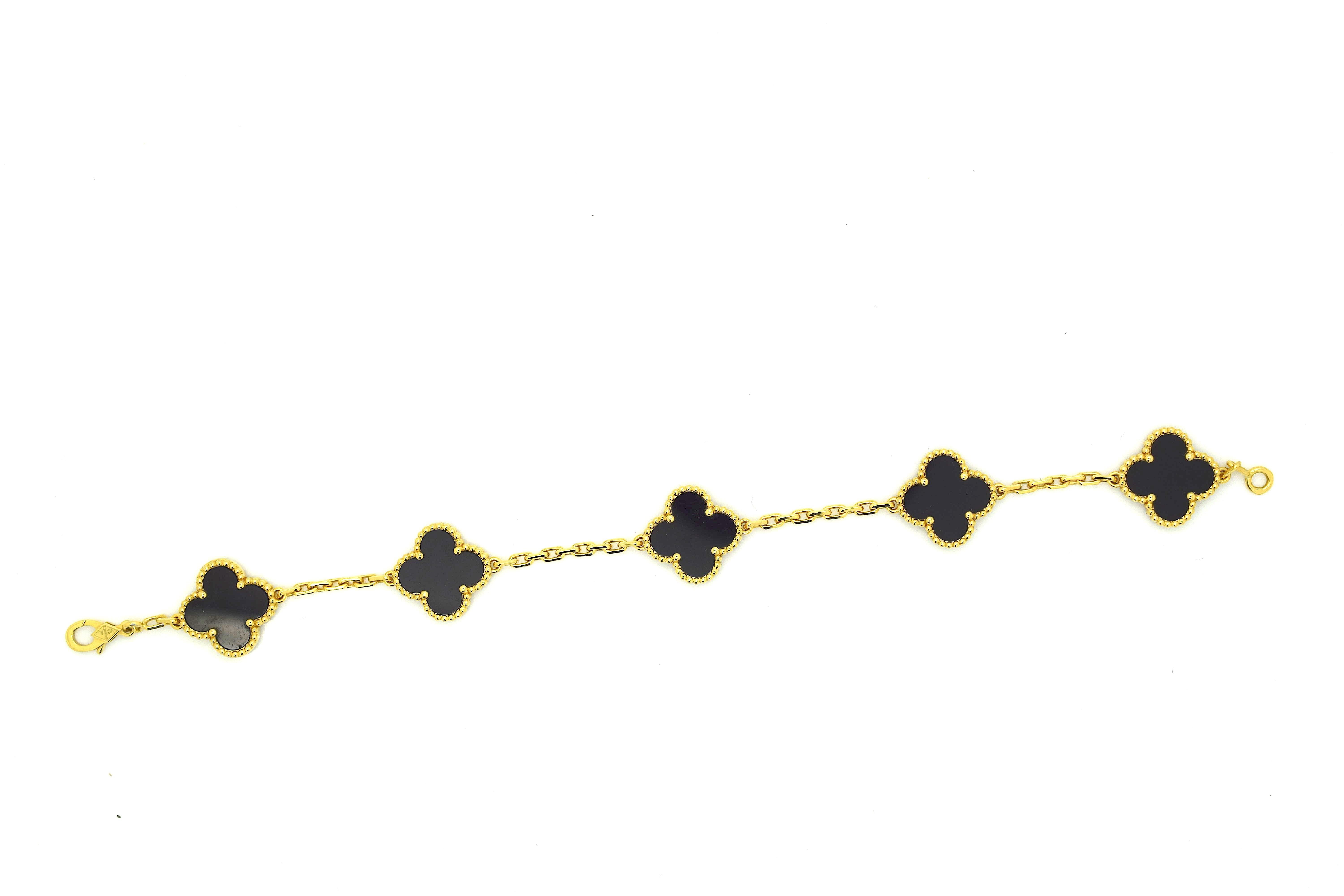 18k Yellow Gold 5-Motif Black Onyx Bracelet by Van Cleef & Arpels. 
Part of VCA's absolutely stunning 