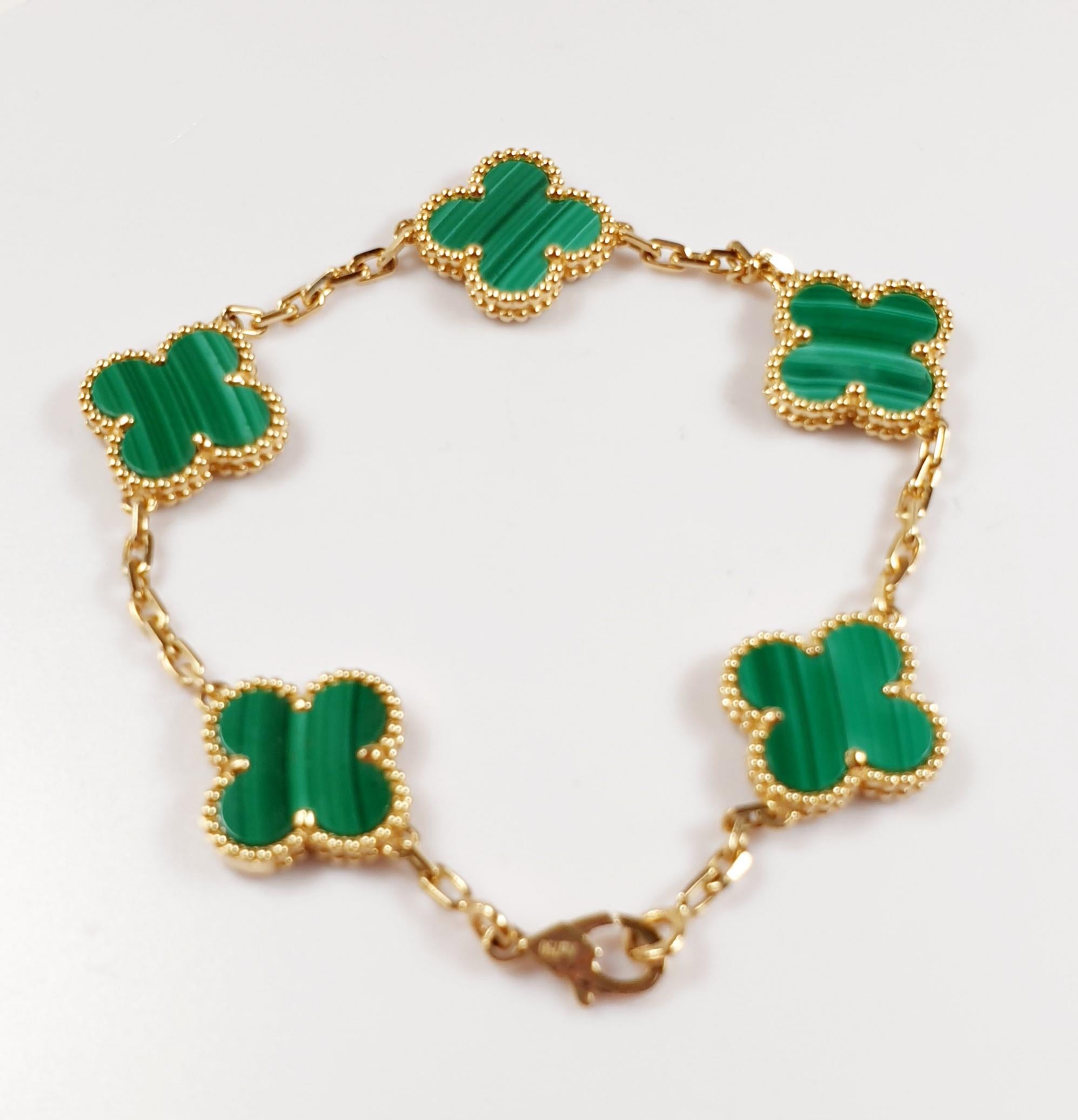 Van Cleef & Arpels Vintage Alhambra Bracelet 5 Motifs Malachite 18K Yellow Gold
This Vintage Alhambra 5 Motifs Malachite Bracelet is made of solid 18K Yellow Gold. This piece is handmade and manufactured by Imperial Time UK Ltd
(15mm diameter