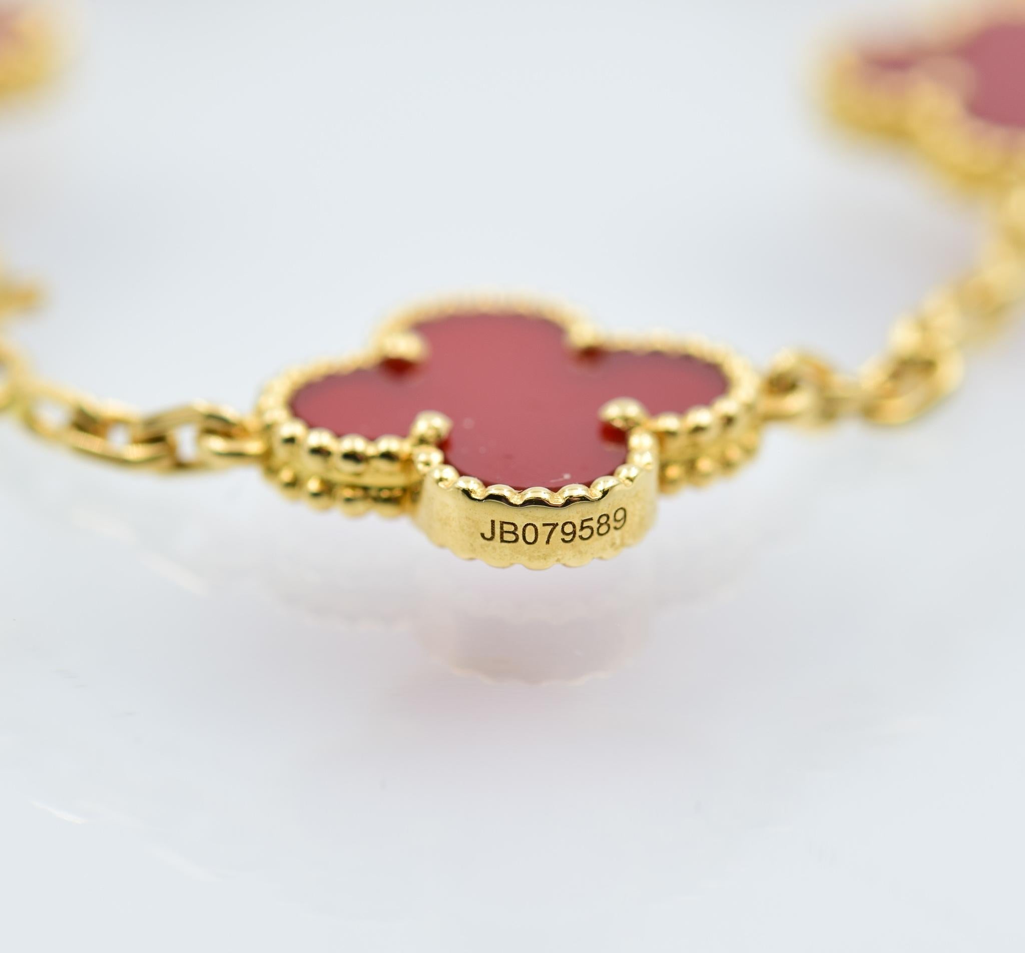 Van Cleef & Arpels Alhambra Carnelian 5 Motif Bracelet in 18 Karat Yellow Gold In Excellent Condition In Carmel, IN