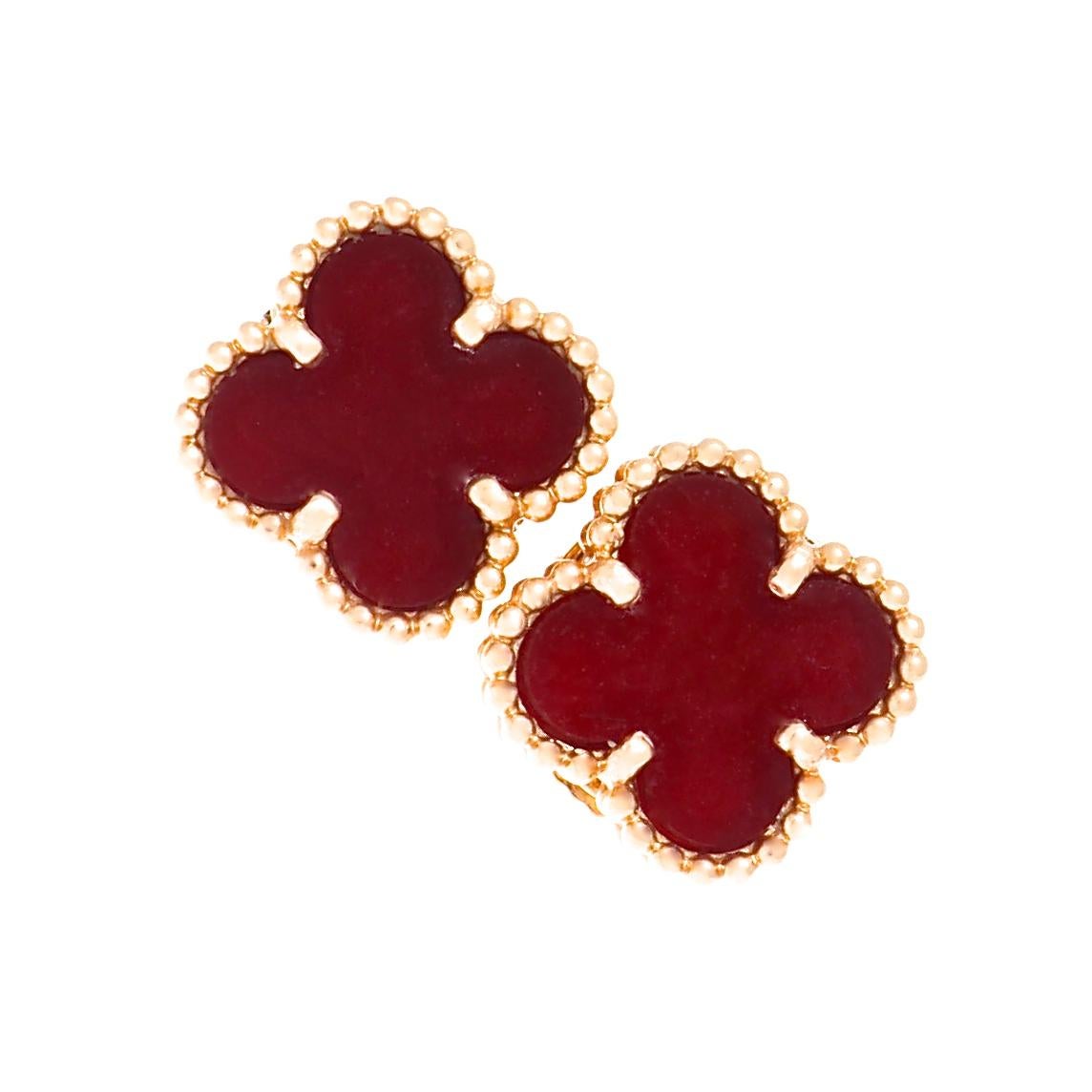 The iconic Alhambra motif from Van Cleef & Arpels, in rich carnelian, set in 18k rose gold. A true symbol of luck and good fortune, expressing continuity and legacy. Since its inception in 1960's Paris, the Alhambra line has captured the hearts of