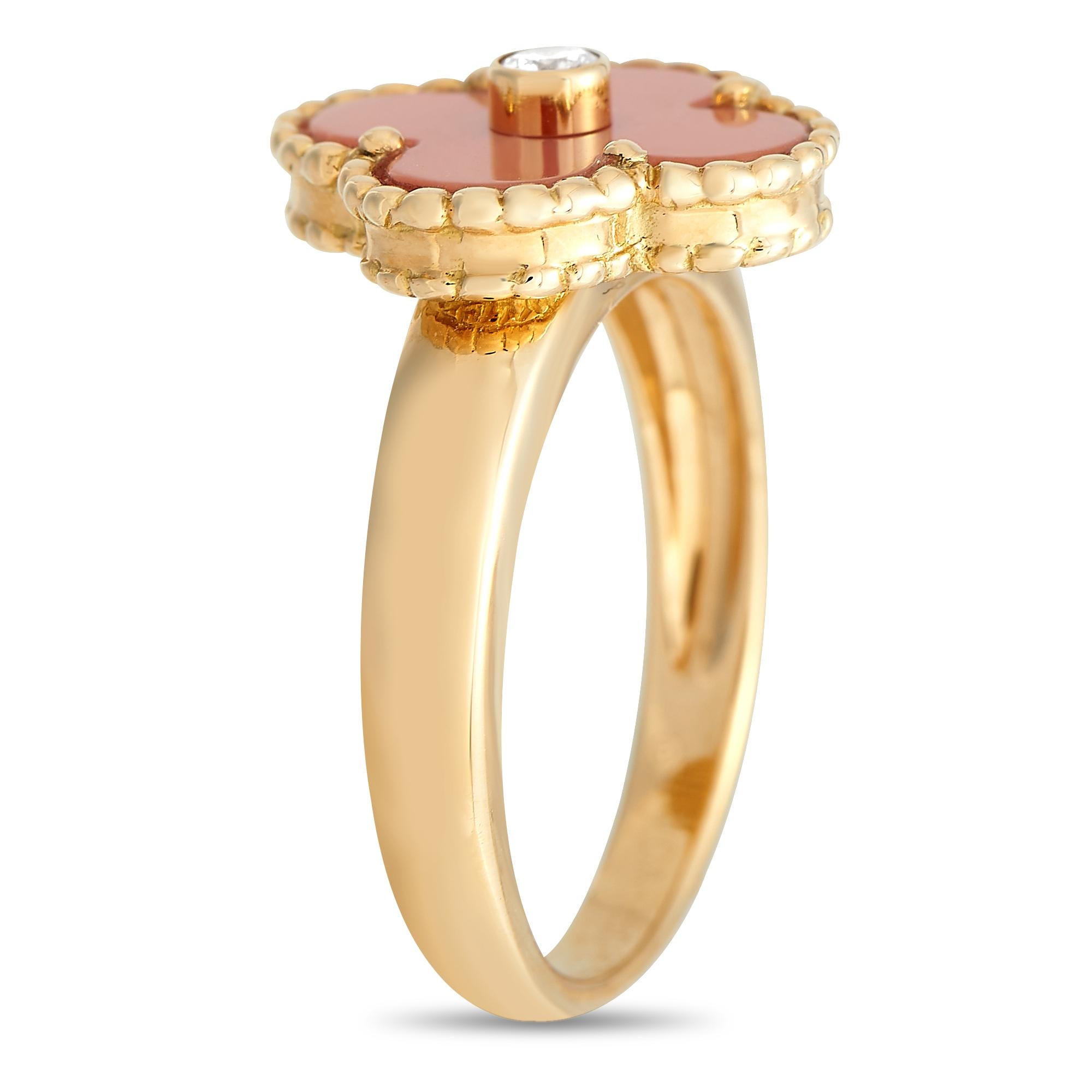 When you think your outfits could use a subtle hint of color, this is the perfect accessory to wear. The Van Cleef & Arpels diamond and coral Alhambra ring offers just the right amount of tint to liven up a minimalist chic outfit. It features a