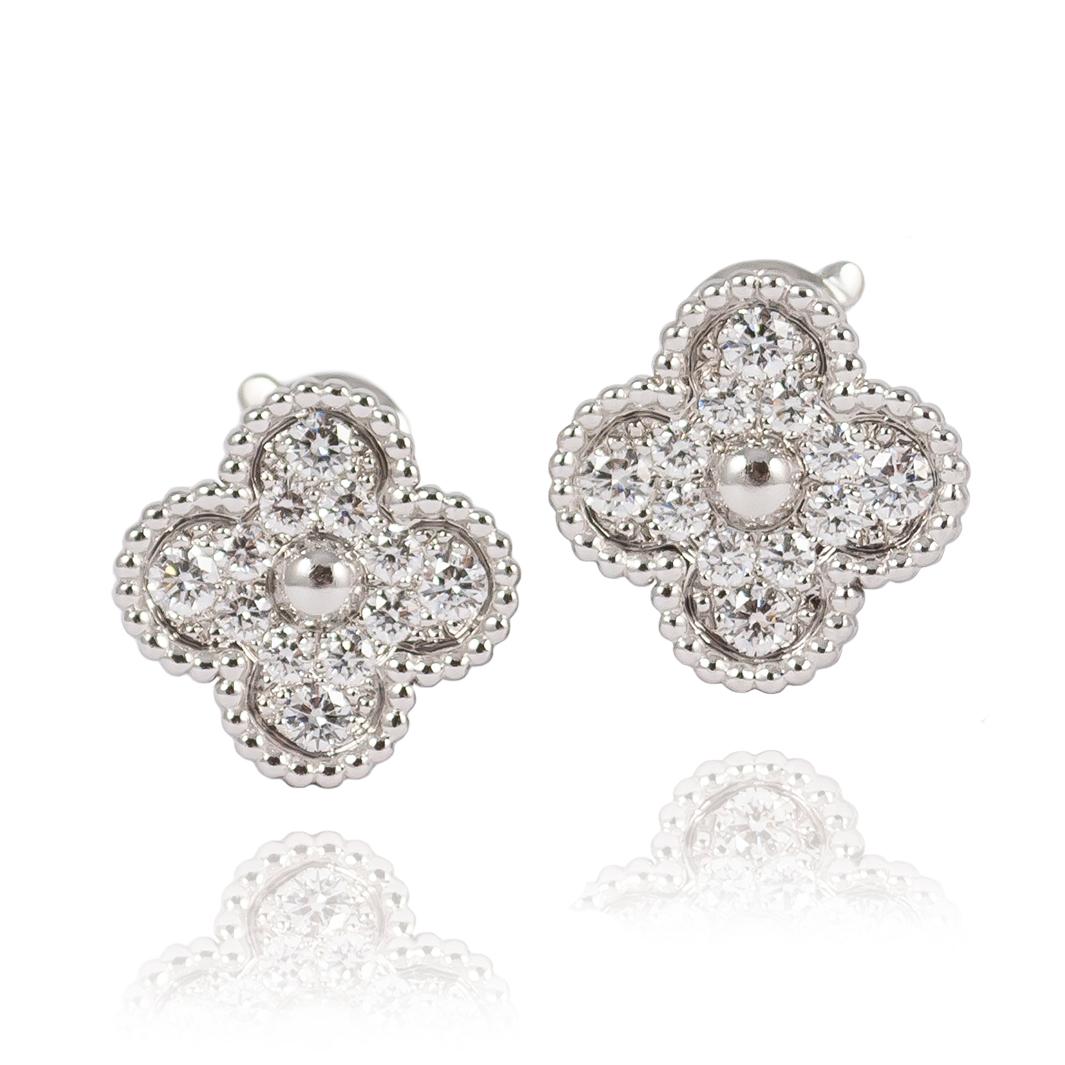 These incredible signed Van Cleef and Arpels Alhambra earrings are the essence of perfection... 
With beaded details that truly highlight the sparkle of brilliant round diamonds, these earrings bring a little slice of happiness to each passing day! 