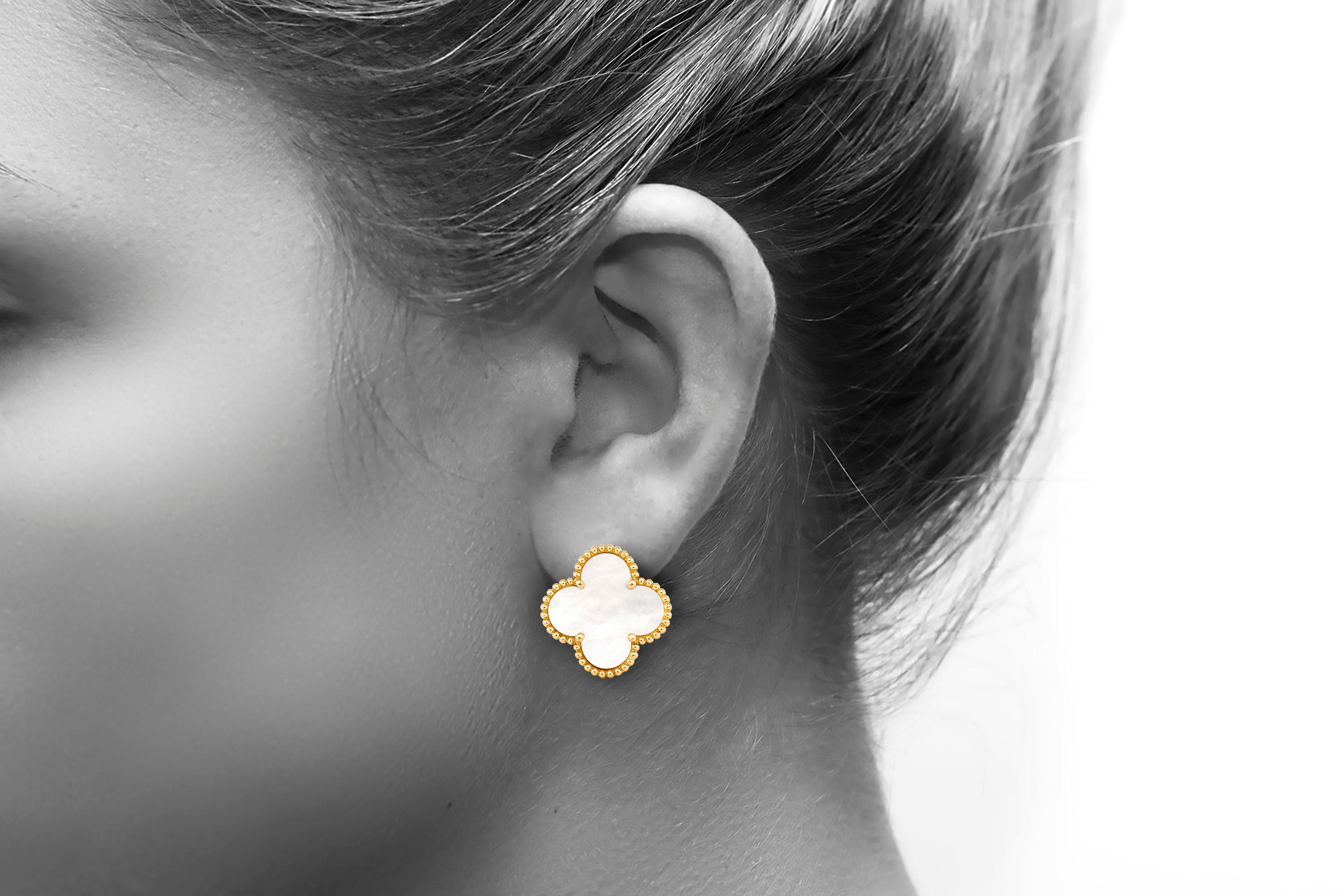 Van Cleef and Arpels Alhambra Mother of Pearl earrings finely crafted in 18k yellow gold.