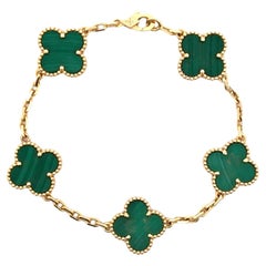 Van Cleef & Arpels Alhambra Malachit-Gliederarmband aus 18 Karat Gelbgold