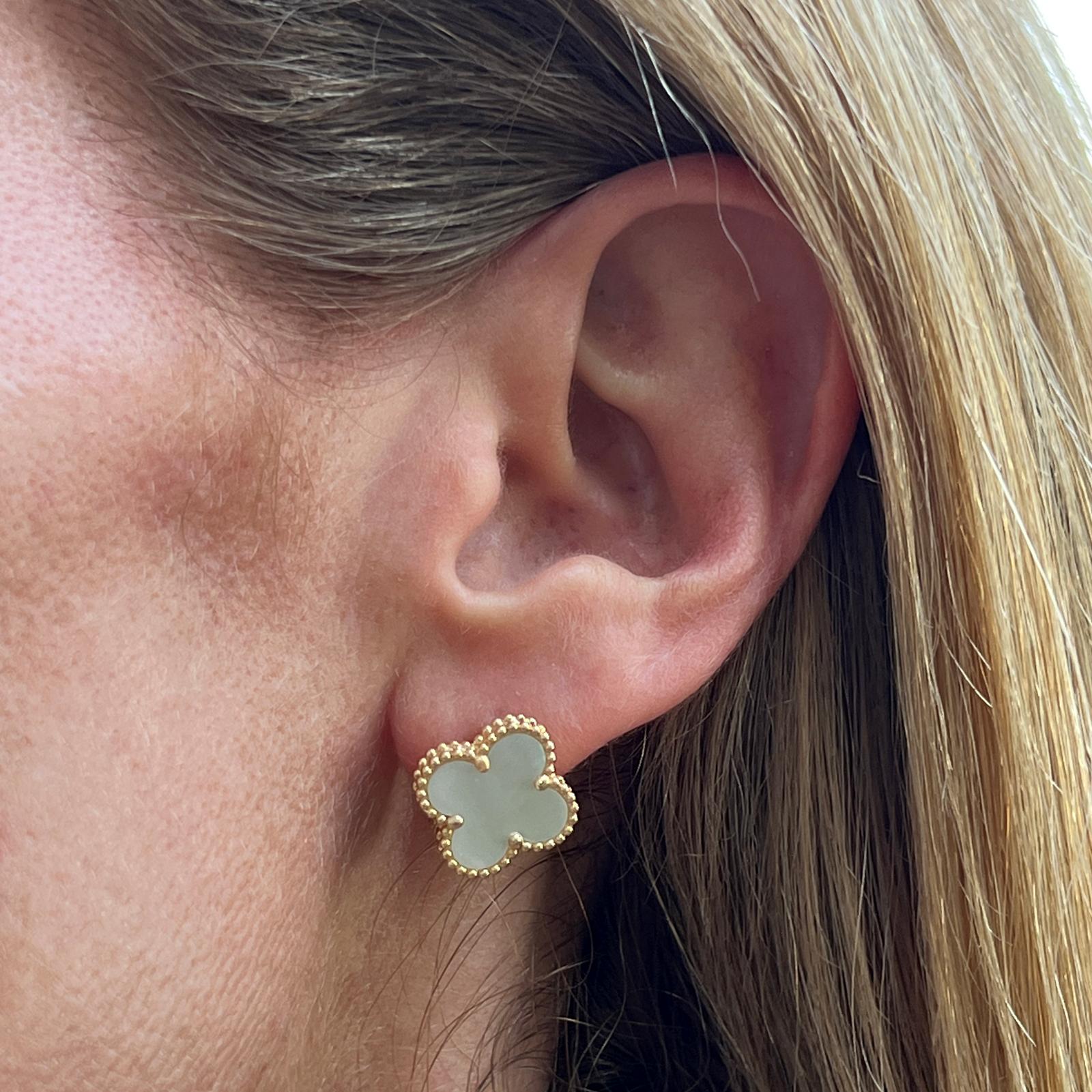 Authentic Van Cleef & Arpels Vintage Alhambra Mother of Pearl earrings crafted in 18 karat yellow gold. These are circa 2019. The earrings measures 15 x 15mm, they are signed, hallmarked and numbered. Come in original box with original paperwork. 