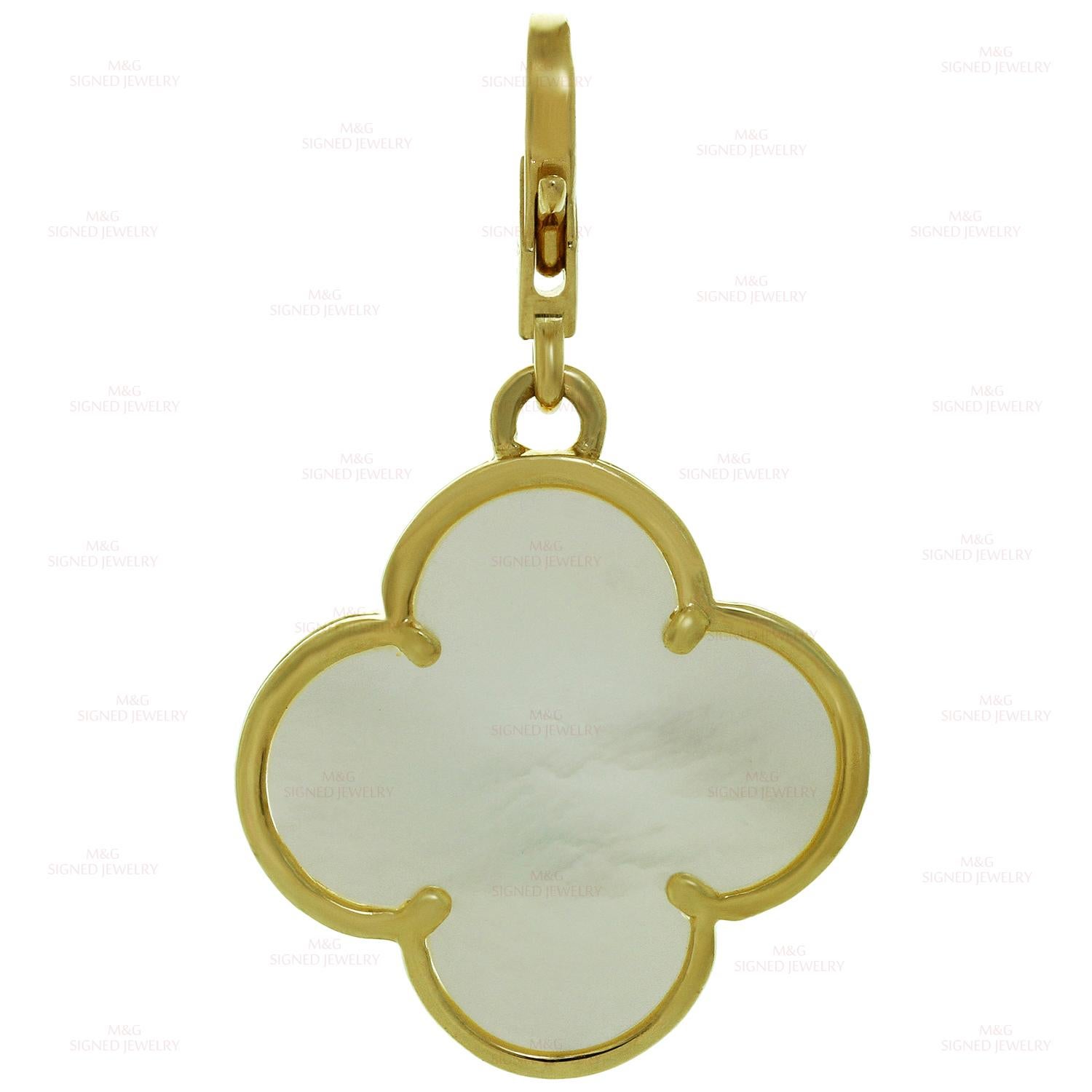 This iconic Van Cleef & Arpels Alhambra pendant features the festive lucky clover design crafted in 18k yellow gold and inlaid with mother-of-pearl. Made in France. Measurements: 0.86