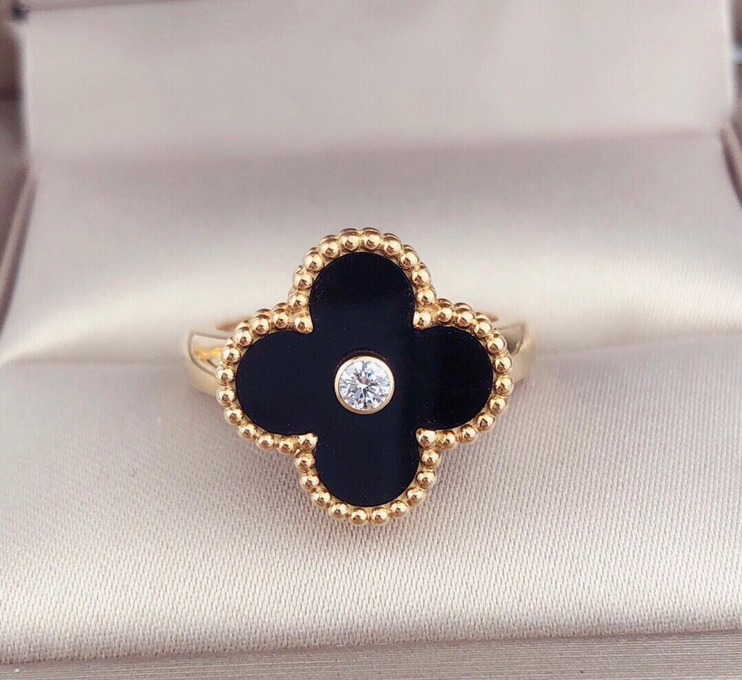 The iconic Alhambra Van Cleef & Arpels Alhambra onyx diamond ring. The iconic cloverleaf design is comprised of a cool onyx, creating a soft glow against your ring.

Retail Price: £2750

Model: Vintage Alhambra Ring 18K Yellow Gold and Onyx with