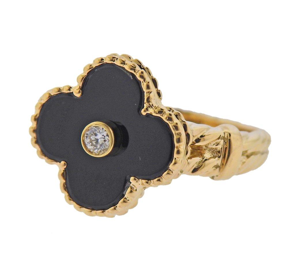 Iconic Alhambra ring by Van Cleef & Arpels, in 18k gold, with center 0.06ct VVS/FG diamond and onyx. Comes with a copy of original receipt. Ring size - 5, top is 14 x 14mm. Weight - 5.2 grams. Marked: VCA, NY, 18k, SN720.344.