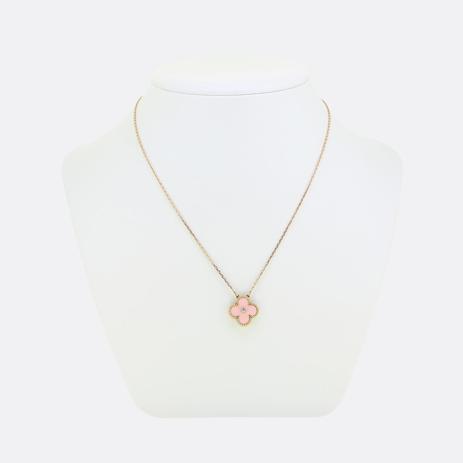 Here we have a limited edition 18ct yellow gold necklace from the world renowned luxury jewellery designer Van Cleef & Arpels. This piece forms part of the Holiday Alhambra collection and features a pendant with a pink porcelain back drop which