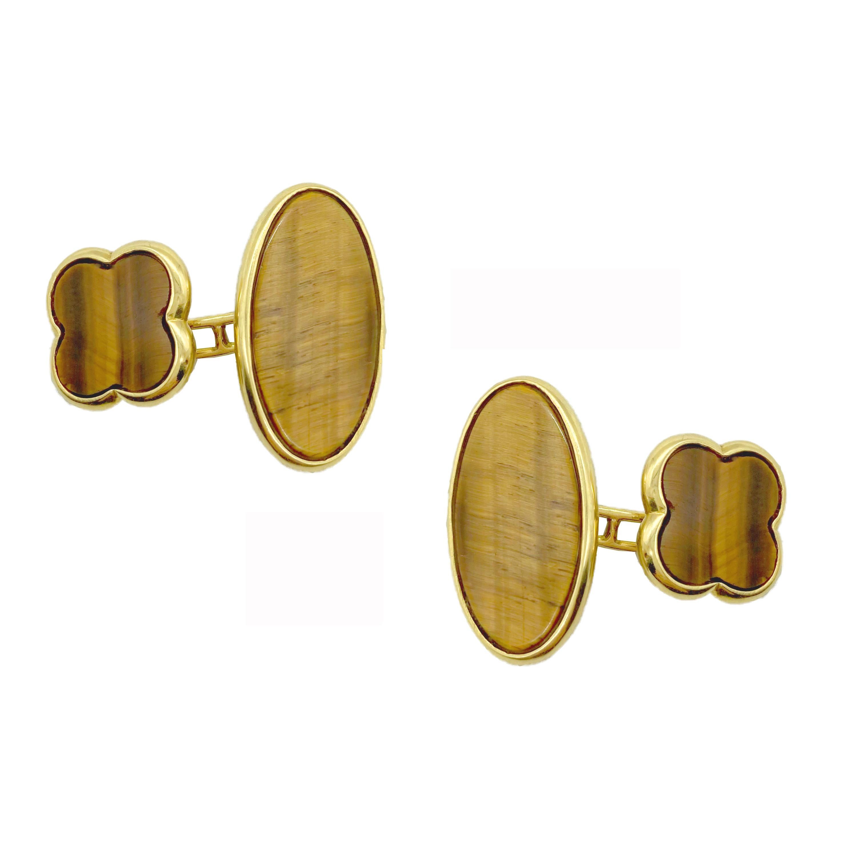 An elegant pair of Van Cleef & Arpels Alhambra tiger’s eye cufflinks.