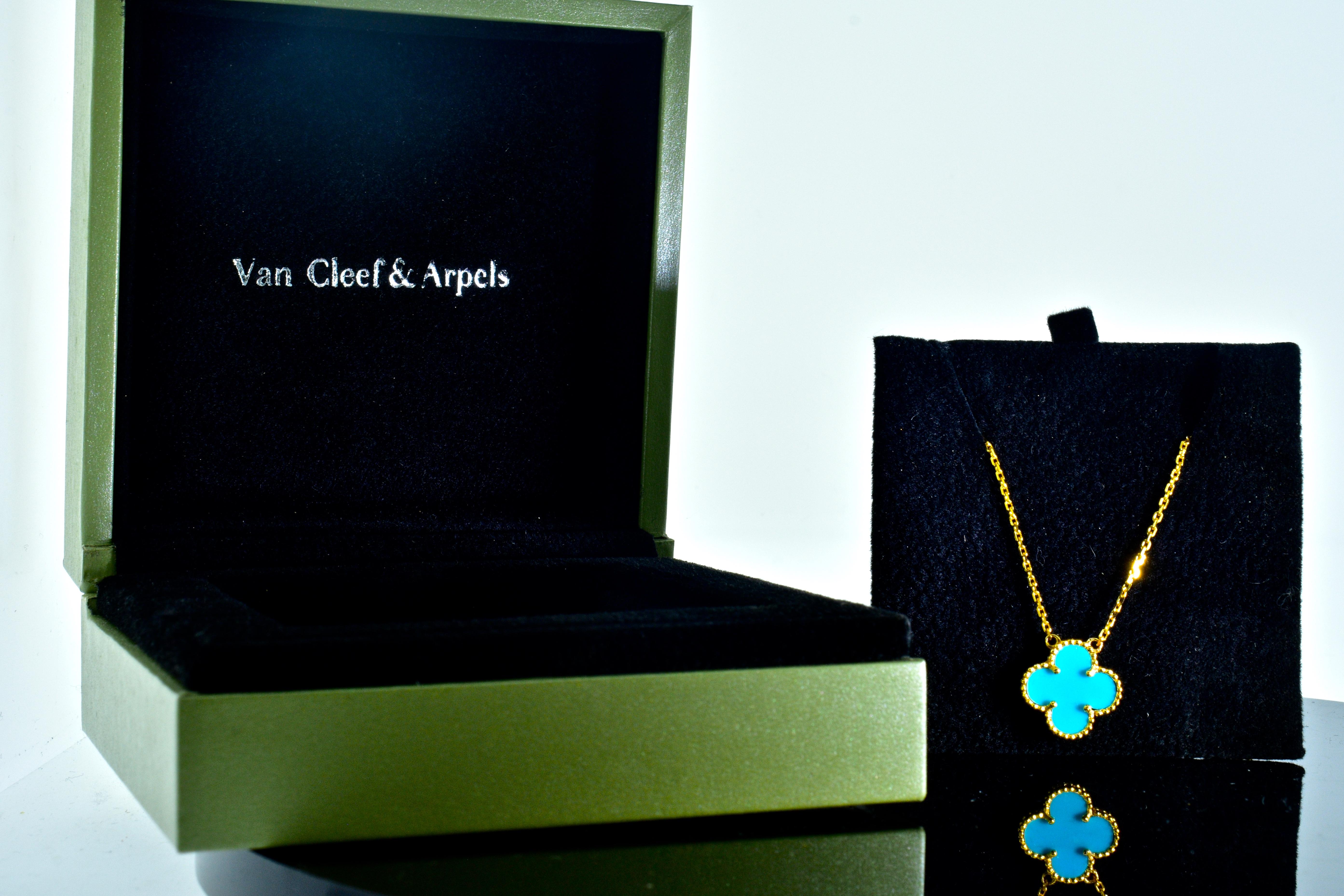 Van Cleef & Arpels Alhambra turquoise single pendant in 18K gold.  The pendant is 5/8th inches and on the original chain which can be worn at 17 inches and slightly shorter at 16 inches.  This vintage piece is signed VC&A (for Van Cleef & Arpels),