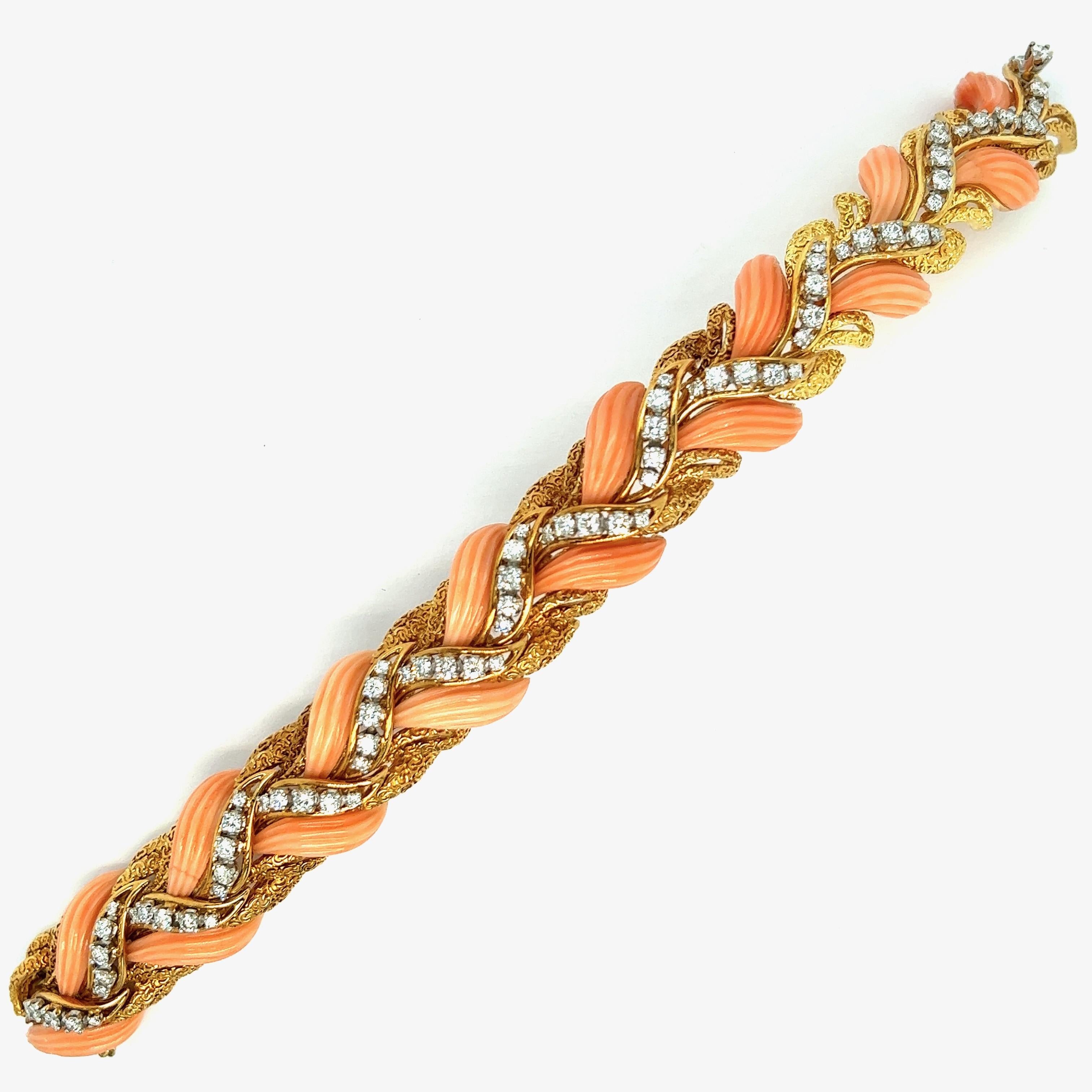 Van Cleef & Arpels angel skin coral diamond bracelet

Finely carved angle skin coral bracelet, with 80 round brilliant-cut diamonds (VS1-VS2, F-G), graduating in size, and weigh approximately 5 carats; marked VCA 

Size: width 0.75 inch, inner