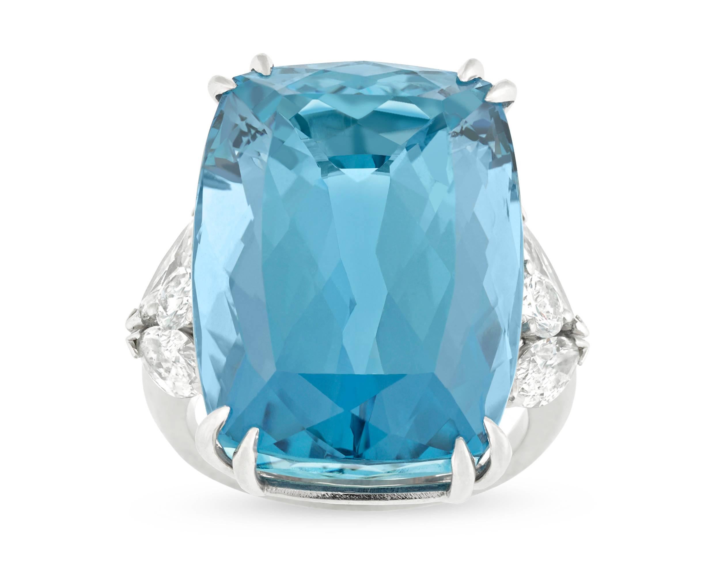 With the stunning blue hue of a clear tropical ocean, the incredible 34.11-carat aquamarine at the center of this Van Cleef & Arpels ring is captivating. With a name derived from the Latin for 