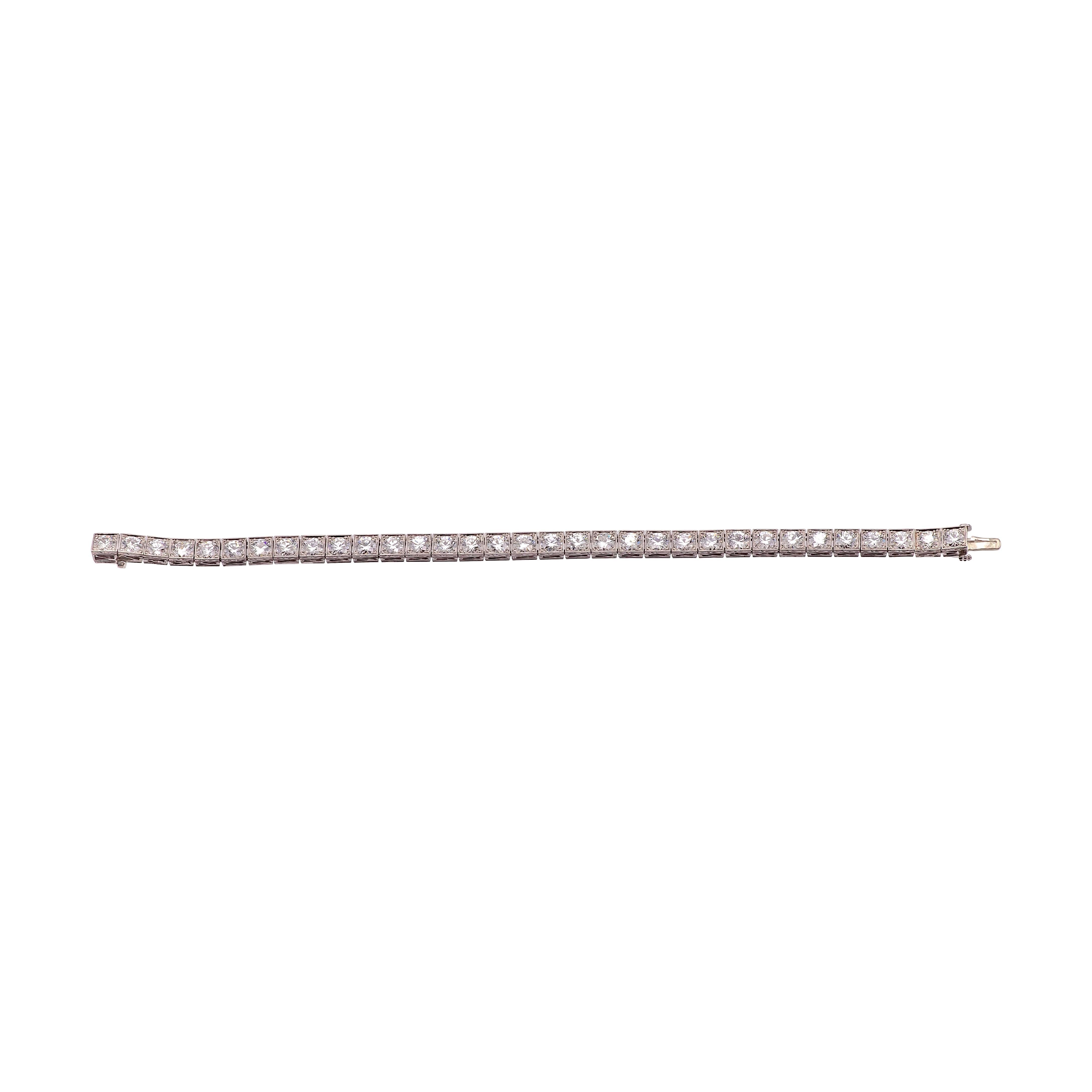 This Van Cleef & Arpels Art Deco bracelet, from the 1930s is a rare find. It's crafted in platinum and features 33 old European transitional-cut diamonds totaling approximately 9.60 carats. The diamonds are of exceptional quality, graded E-F color