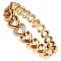 Van Cleef & Arpels Articulated Heart Bracelet in 18 Carat Gold and Diamonds
