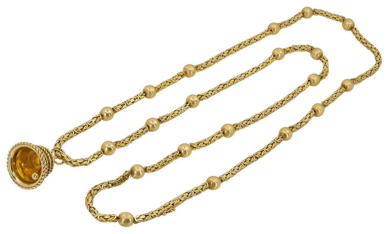 Van Cleef & Arpels Bell Charm Byzantine Chain Necklace in 18k Yellow Gold.
Measures approx. 39″ in length. Weight approx 81 dwt. French assay mark. Signed “VCA”; circa 1960’s.
