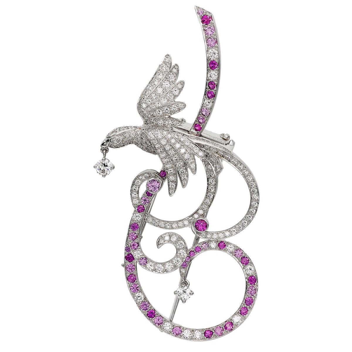 An incredible Van Cleef & Arpels Bird of paradise, set with brilliant-cut diamonds and pink sapphires mounted in 18 karat white gold. The brooch can be worn as a pendant as well and the pink sapphires range from low to strong saturation creating an