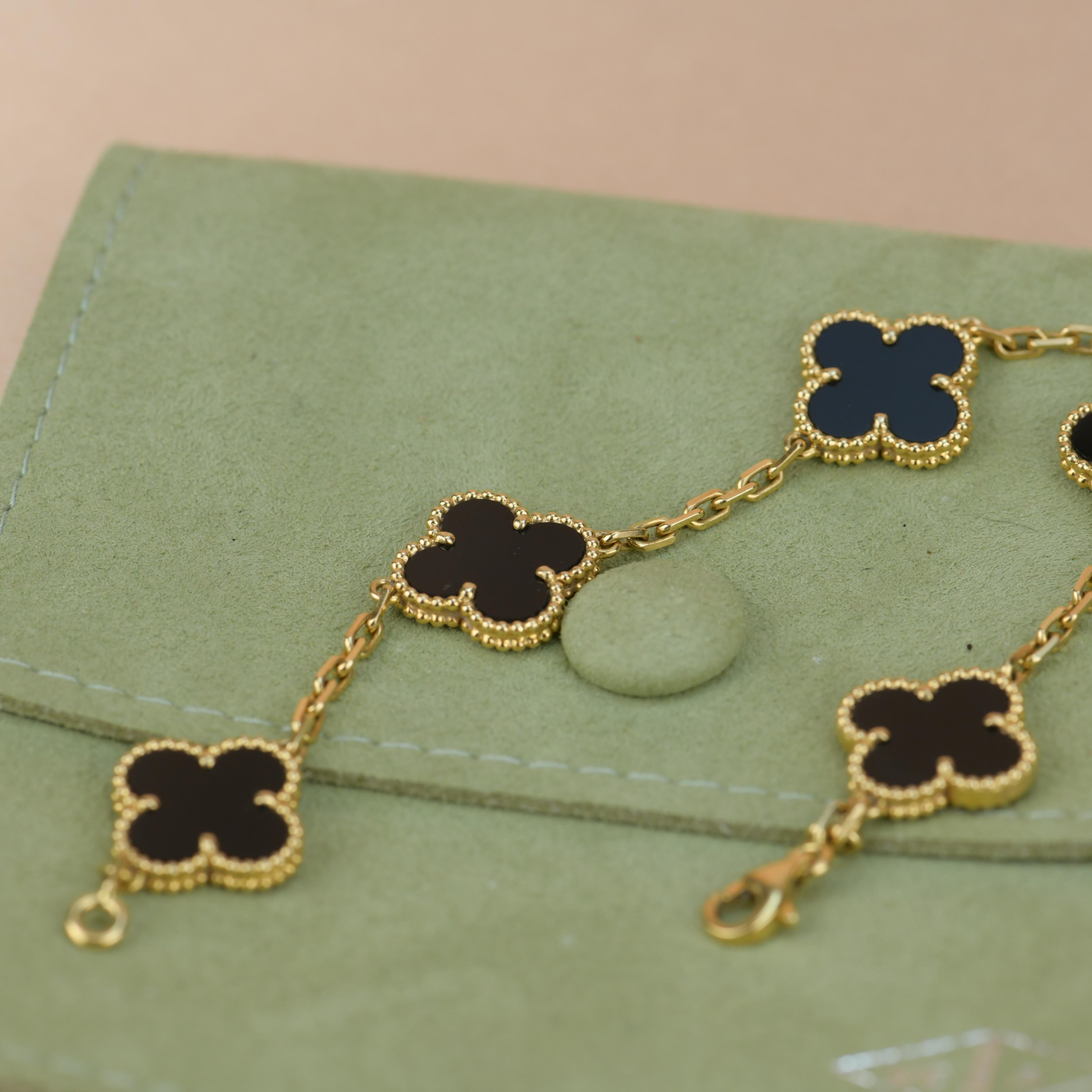 An 18k yellow gold bracelet from the Vintage Alhambra collection by Van Cleef and Arpels. The bracelet is made up of 5 iconic clover motifs, each set with a beaded edge and a black onyx inlay, set throughout the length of the chain.

Dandelion