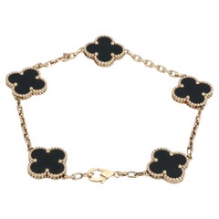 Van Cleef & Arpels Bracelet vintage Alhambra en or 18 carats et onyx noir