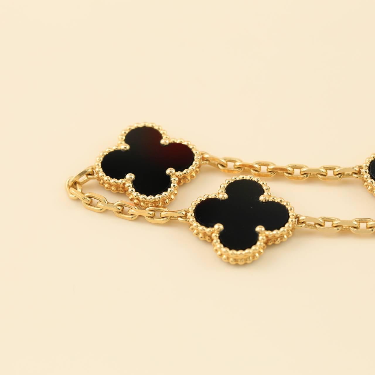 Women's or Men's Van Cleef & Arpels Black Onyx Vintage Alhambra Yellow Gold Bracelet