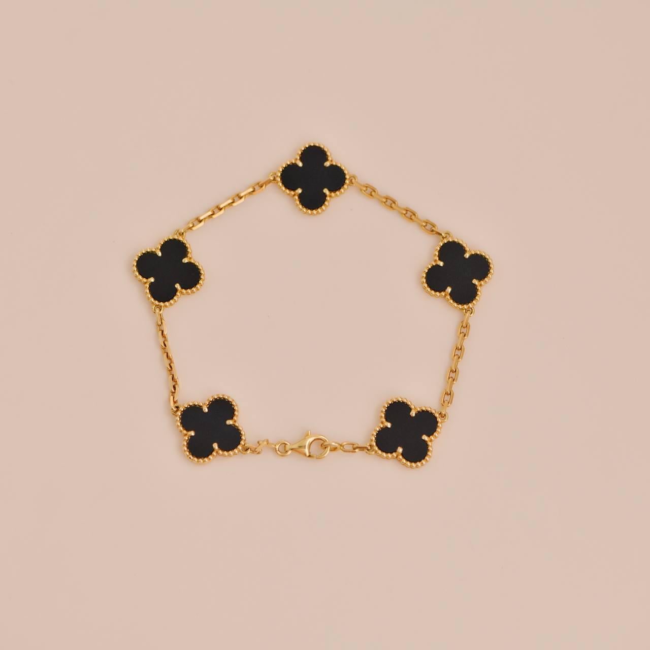 Women's or Men's Van Cleef & Arpels Black Onyx Vintage Alhambra Yellow Gold Bracelet