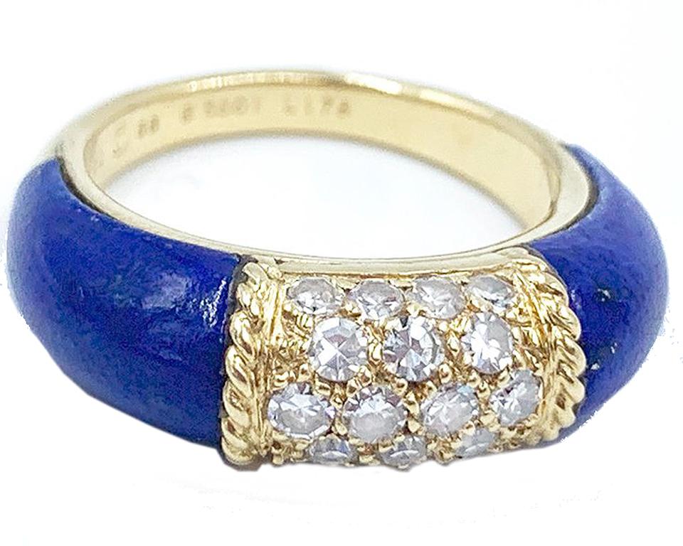 An elegant ring from Van Cleef & Arpels crafted in 18k Yellow Gold, Blue Lapis and 0.75 cts in diamonds, set between gold ropes. 
Signed VCA with appropriate hallmarks 
Size 6

*Looks great stacked with our VCA yellow gold and diamond ring! 