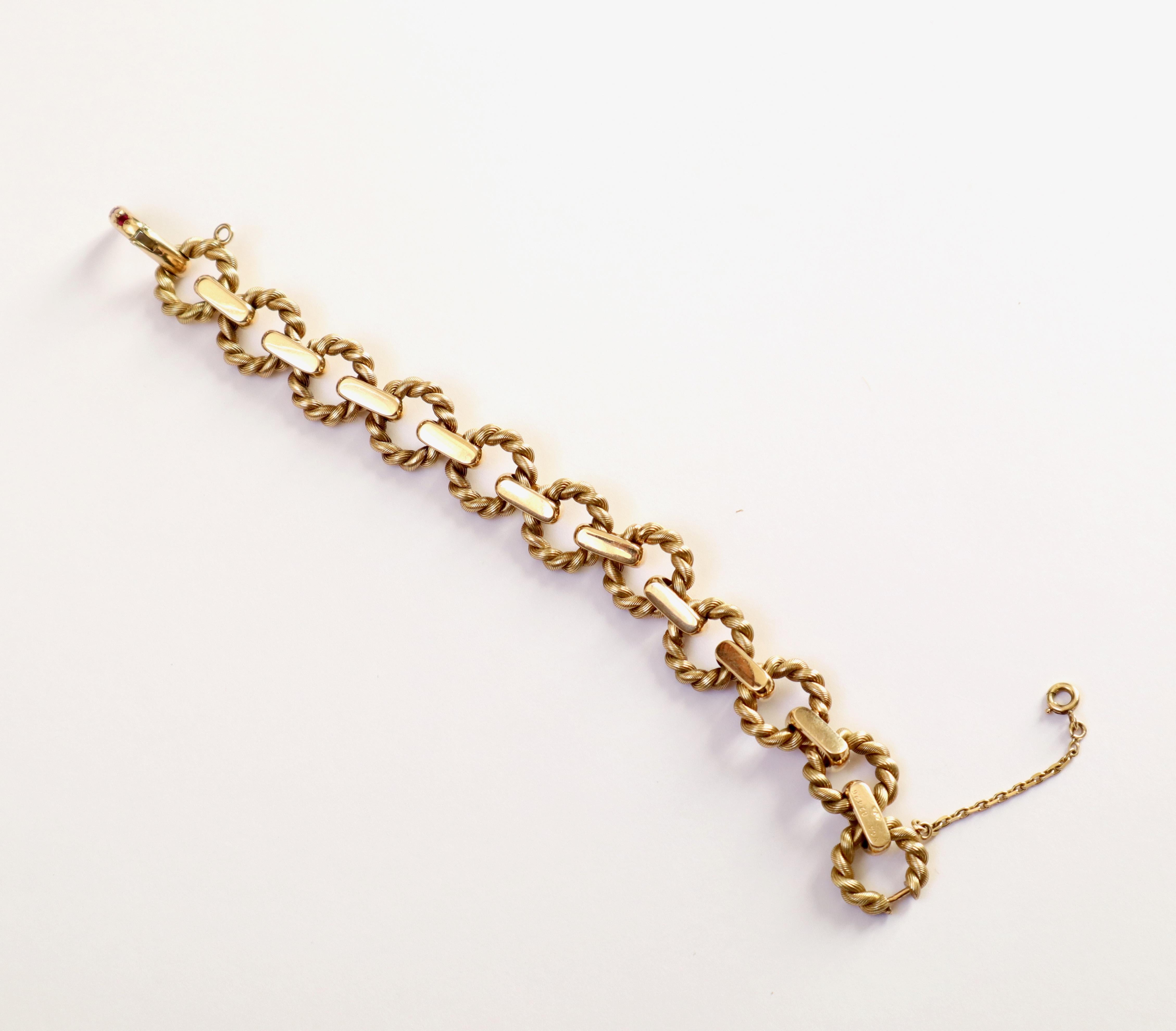 Van Cleef & Arpels Bracelet en or jaune 18 carats et rubis avec cercles torsadés Unisexe en vente