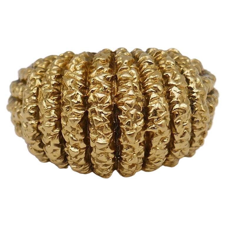 A gorgeous vintage 18k yellow gold dome ring by Van Cleef & Arpels. Stamped with VCA maker's mark, a hallmark for 18k gold and a French mark.
Measurements: the ring size is 7.5. The dome height is 5/8
