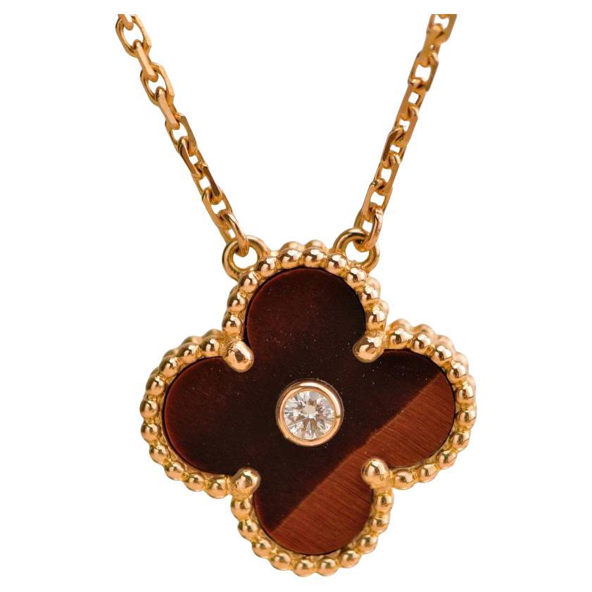 Van Cleef
Arpels Collier à pendentifs en or rose 18 carats avec diamants Bullseye pour les fêtes de fin d
année 2017