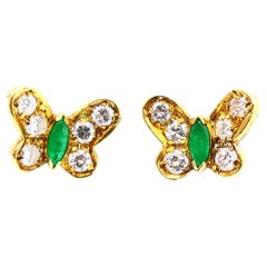 Van Cleef & Arpels Boucles d'oreilles papillon en or 18 carats avec diamants et émeraudes