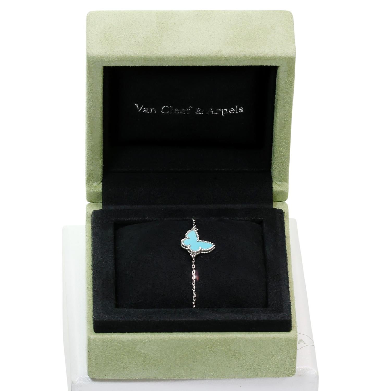 This stunning Van Cleef & Arpels bracelet from the iconic Sweet Alhambra collection feature a butterfly charm crafted in 18k white gold and set with blue turquoise. Made in France circa 2016. Excellent condition. Comes with original box and