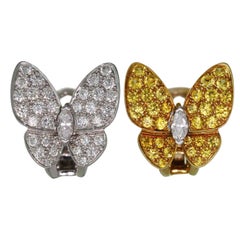 VAN CLEEF & ARPELS Boucles d'oreilles papillon en or, saphir jaune et diamant