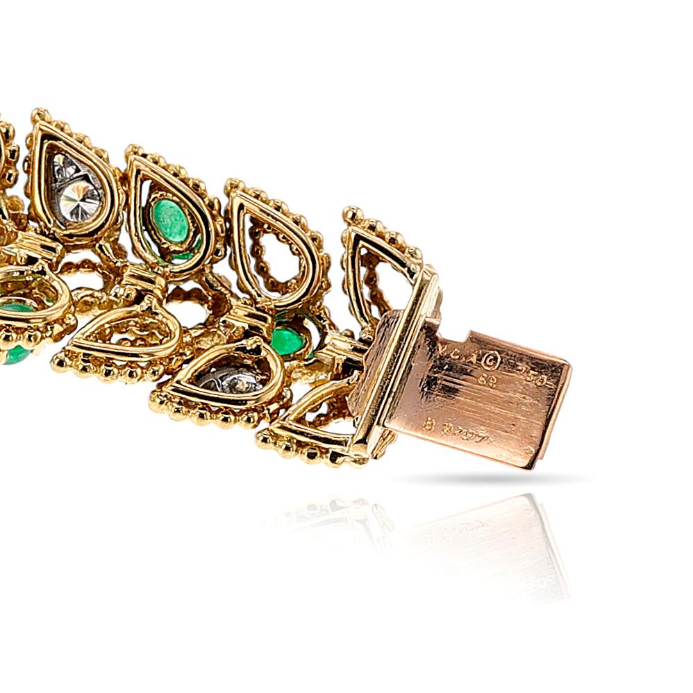 Van Cleef & Arpels by Andre Vassort  Emerald, Ruby and Diamond Bracelet, 18k In Excellent Condition For Sale In New York, NY
