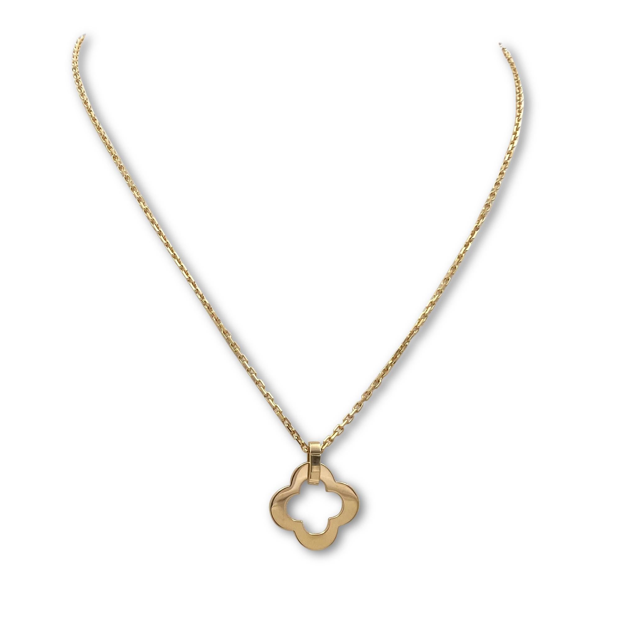 Authentic Van Cleef & Arpels Byzantine Alhambra pendant necklace crafted in 18 karat yellow gold and featuring a single clover-inspired openwork motif.  The pendant hangs from an 18 1/2 inch adjustable chain.  Signed VCA, Au750, with serial number
