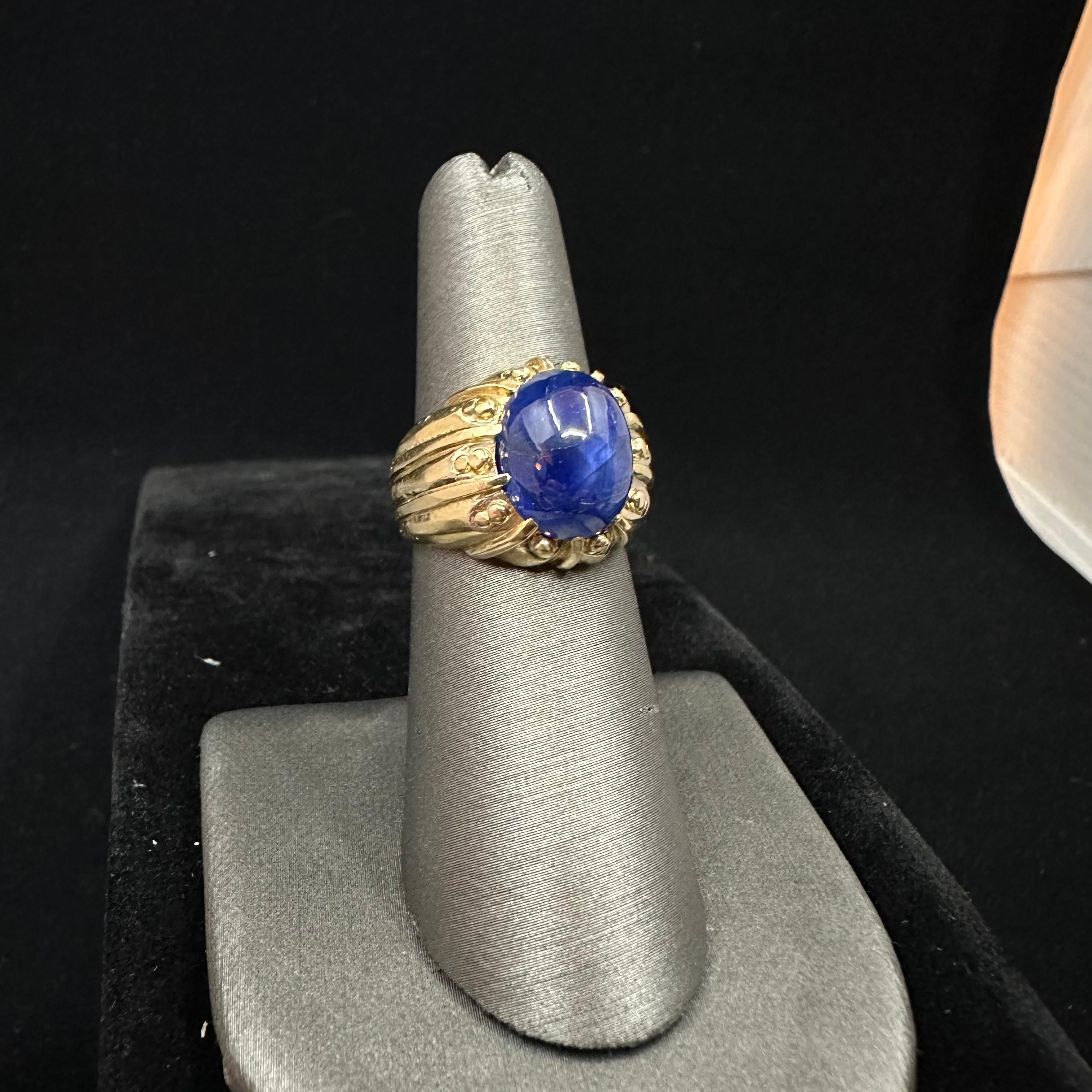 VCA Italy Cabochon blue sapphire, 7.32 ct Ring
Gia Report: Burma No Indictions of Heating
Size 5.25
Measurements: 12.35 x 9.75 x 5.94 mm
Pleasant Burmese color sapphire
Clarity: visible inclusions to the naked eye, this ring boast a wonderful color