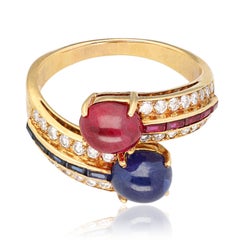 VAN CLEEF & ARPELS Cabochon Ruby and Sapphire "Vous et Moi" Bypass Ring