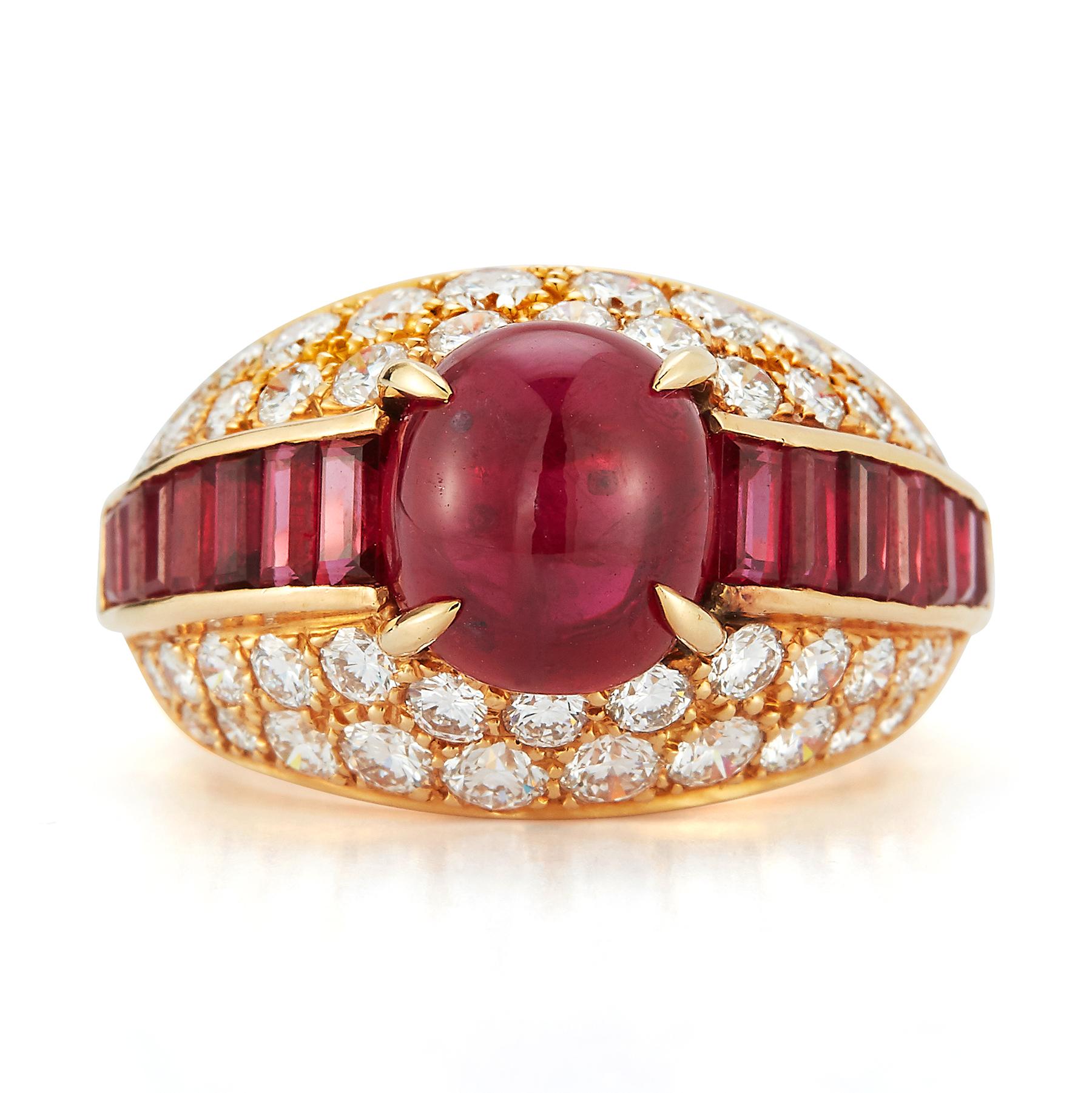 Van Cleef & Arpels Cabochon Ruby & Diamond Men's Ring 

1 cabochon ruby  set with emerald cut rubies & round cut diamonds in 18k yellow gold 

Cabochon Ruby Weight: approx 4.00 cts 

Baguette Cut Ruby Weight: approx 2.00 cts

Round Cut Diamond