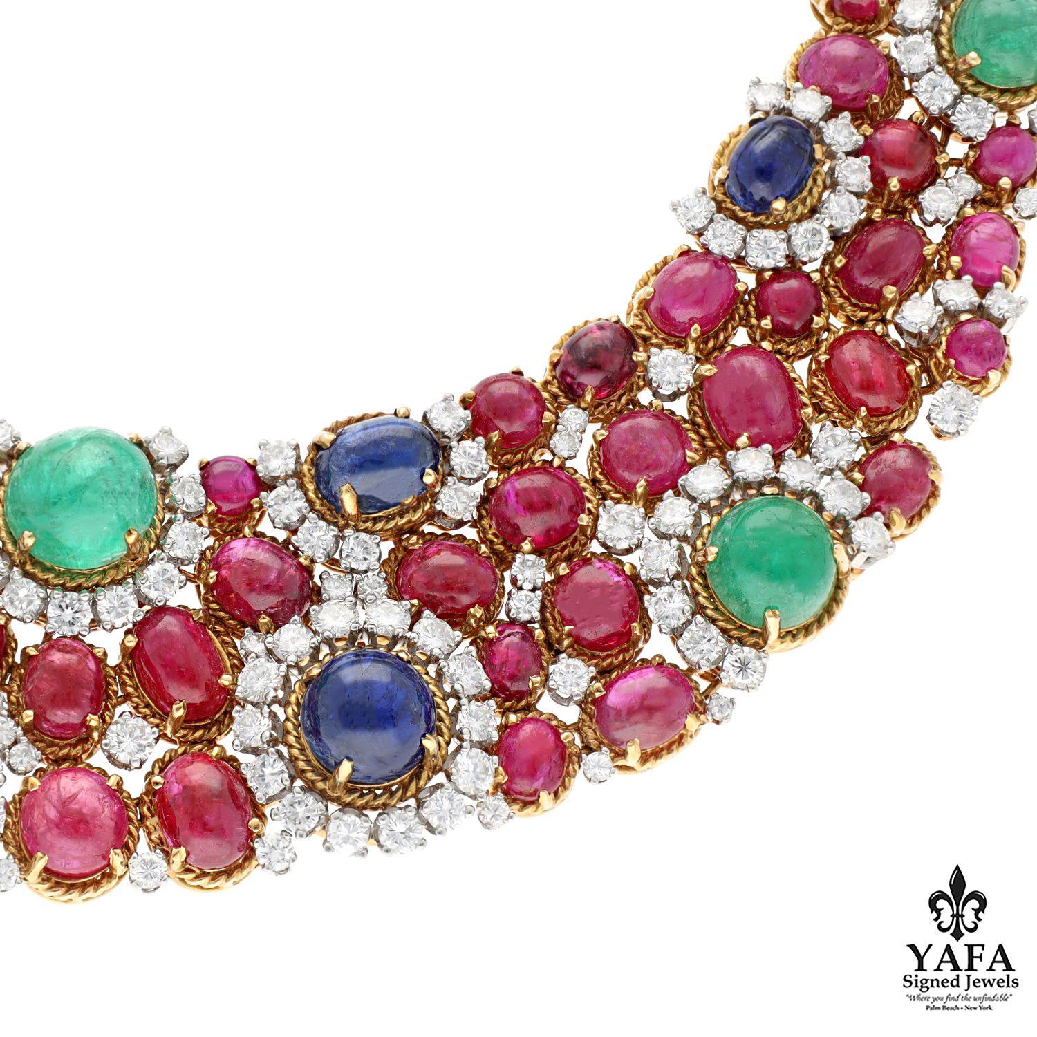 Like Gemstones Tumbled Smooth by a Babbling Brook Through the Centuries, this Work of Art Gleams with Life and Light. Intertwined Throughout are 13 Cabochon Sapphires, 11 Cabochon Emeralds, Numerous Rubies and Diamonds all set in Platinum and 18K