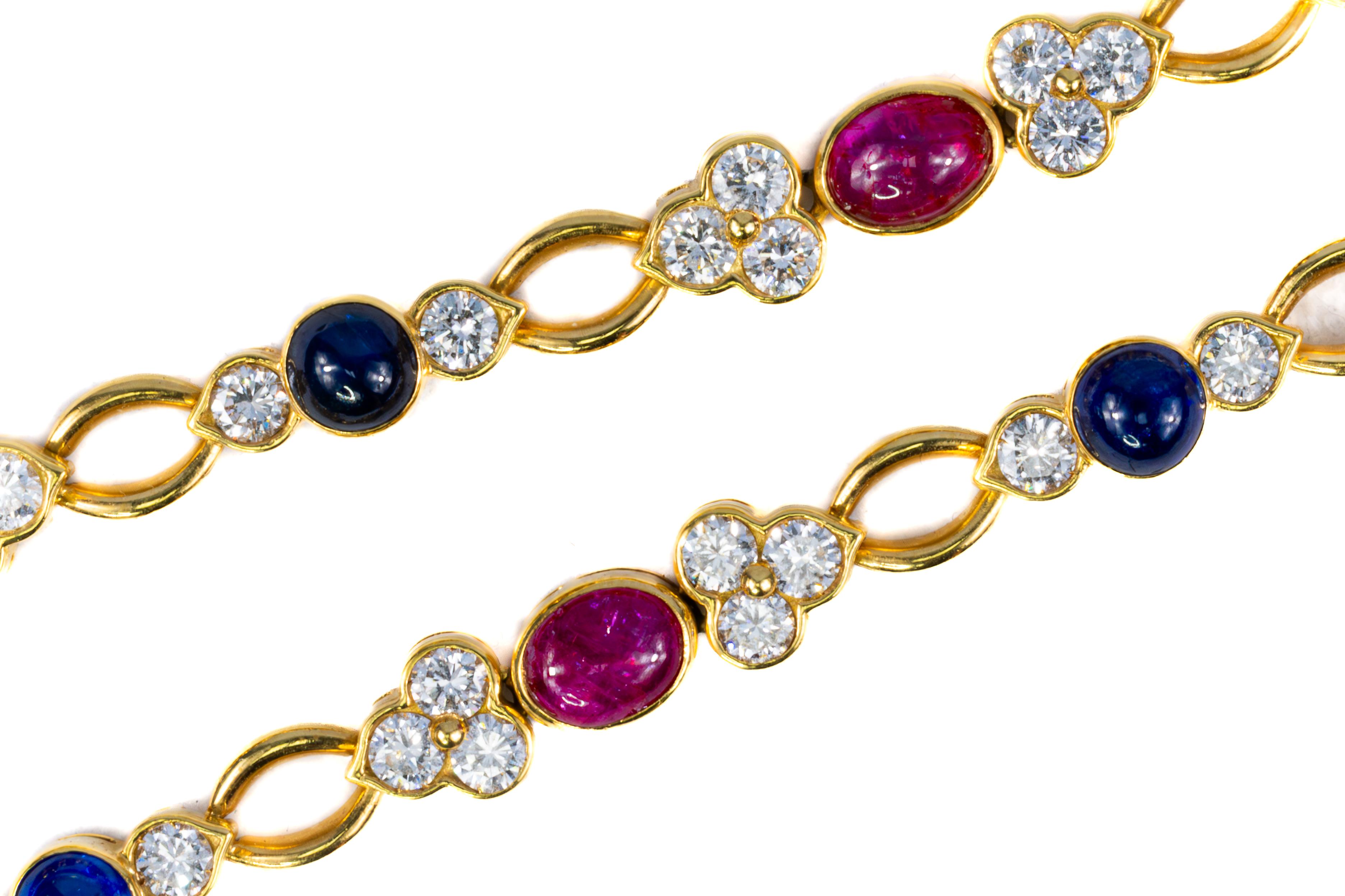 Van Cleef & Arpels Cabochon Ruby, Sapphire, and Diamond Necklace

Description:
Crafted by Van Cleef & Arpels, this elegant necklace features alternating cabochon rubies and sapphires interspersed with diamond quatrefoil motifs and delicate open gold