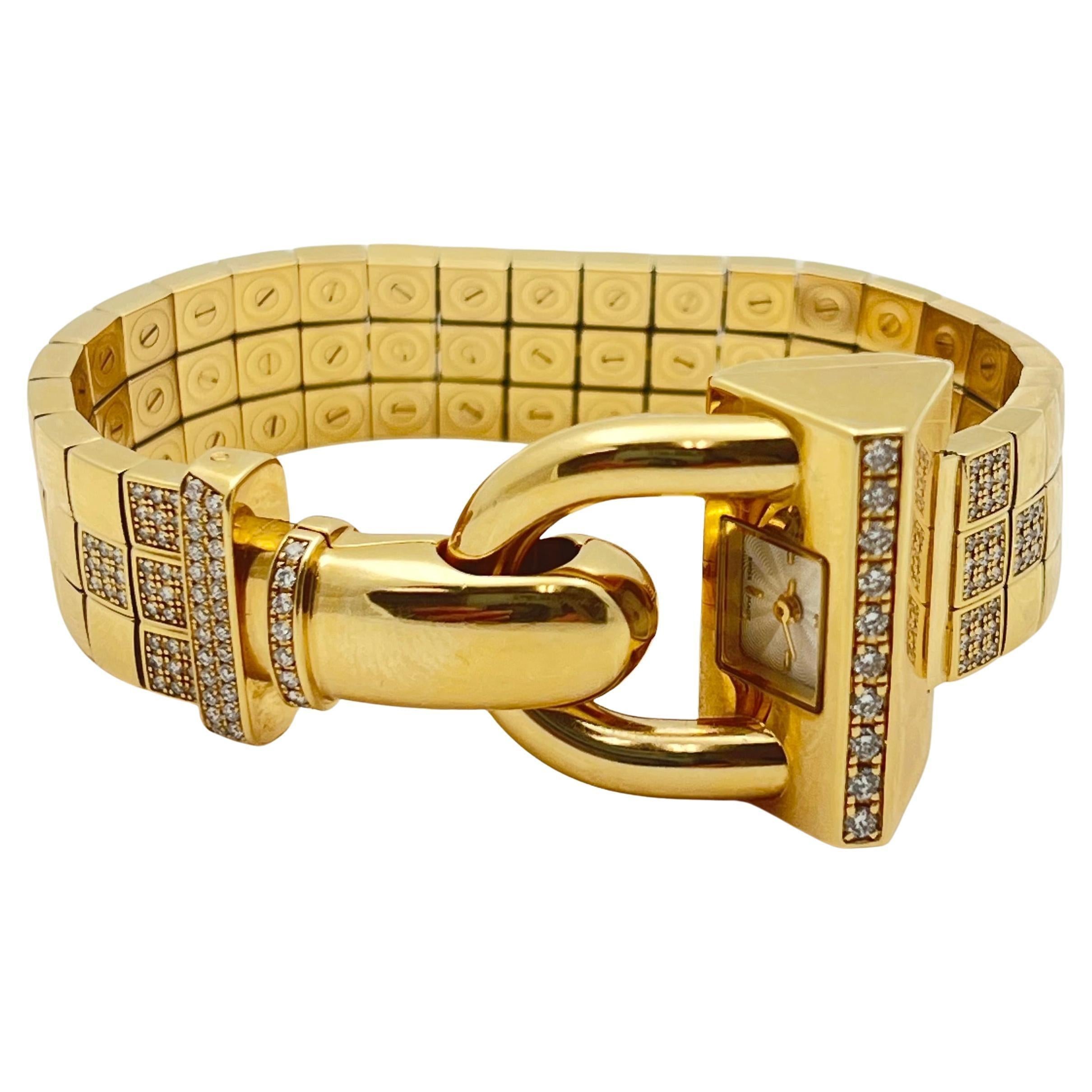 Van Cleef & Arpels Cadenas bracelet wristwatch in 18k yellow gold, designed as a band of three gold square-shaped motif links the ends accented by round brilliant-cut diamonds, joined by a clasp with a watch powered by a quartz movement and