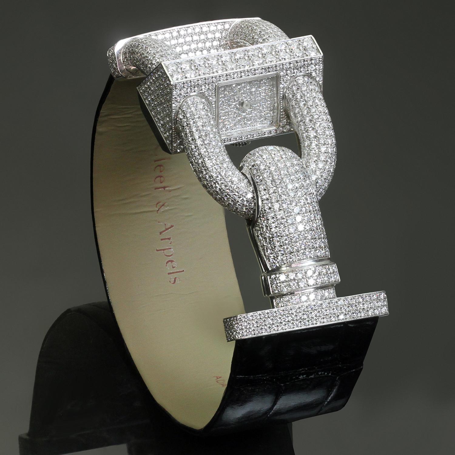 Cette exquise montre-bracelet Van Cleef & Arpels Brilliante est réalisée en or blanc 18 carats, sertie de 1858 diamants ronds de taille brillant D-F VVS1-VVS2 d'un poids estimé à 10,50 carats et complétée par un bracelet en alligator noir satiné à