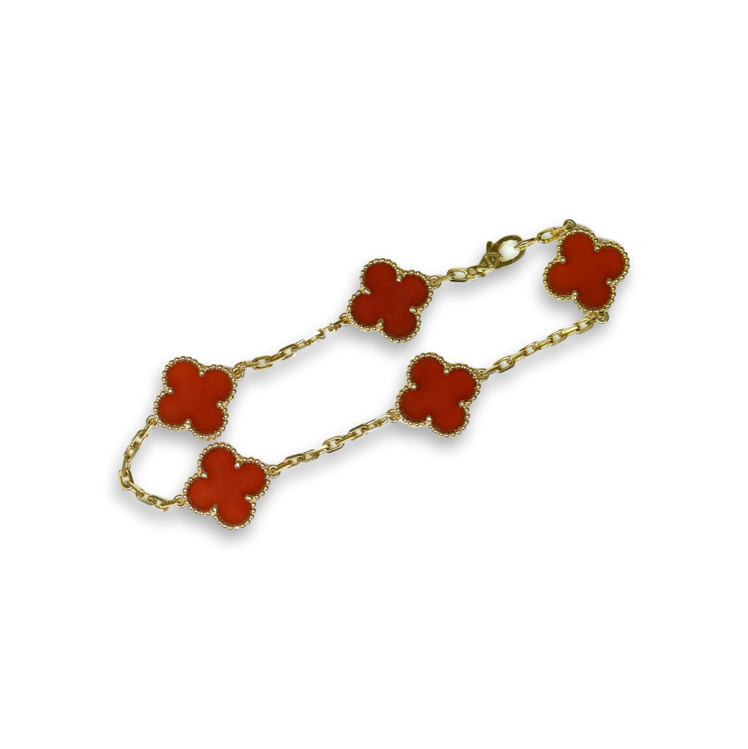 This stunning, vintage, VCA carnelian 18k gold bracelet, showcases the classic Alhambra design. Reflective of the very first creations by Van Cleef and Arpels in 1968, such pieces are characterised by their unique and timeless sophistication. In