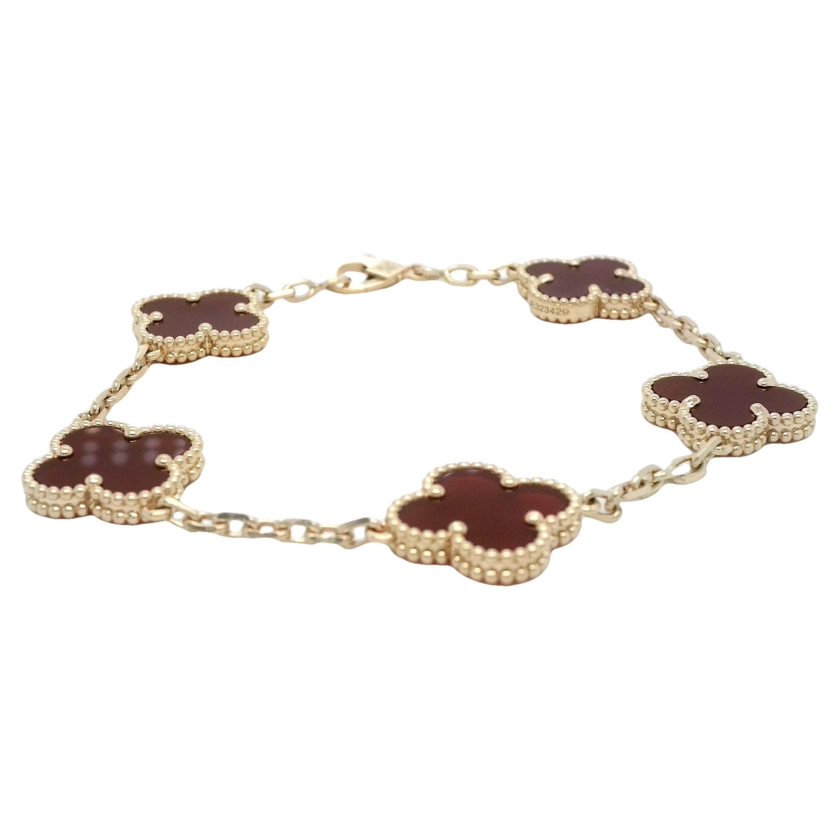 Van Cleef & Arpels Carnelian bracelet VCARD35500
VCA signature design, first created in 1968, this timeless collection brings luck to each owner by its clover leaf. 
An iconic collection, the Alhambra is a symbol of luck, with a border of golden