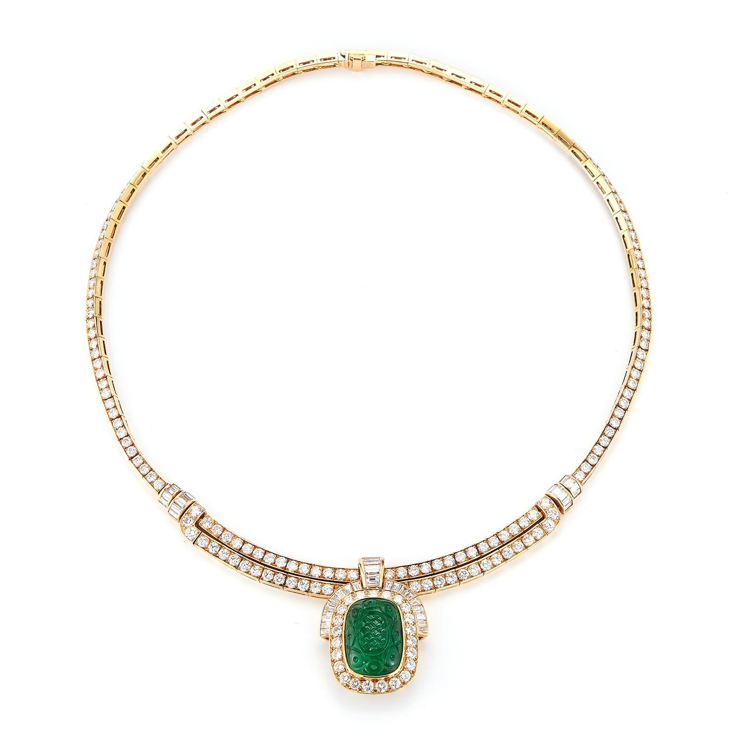 Van Cleef and Arpels Carved Emerald Diamond Necklace
Approximately 13 carats of diamonds
1 magnificent hand carved emerald 
Signed Van Cleef & Arpels and numbered
Measurements: 14.5