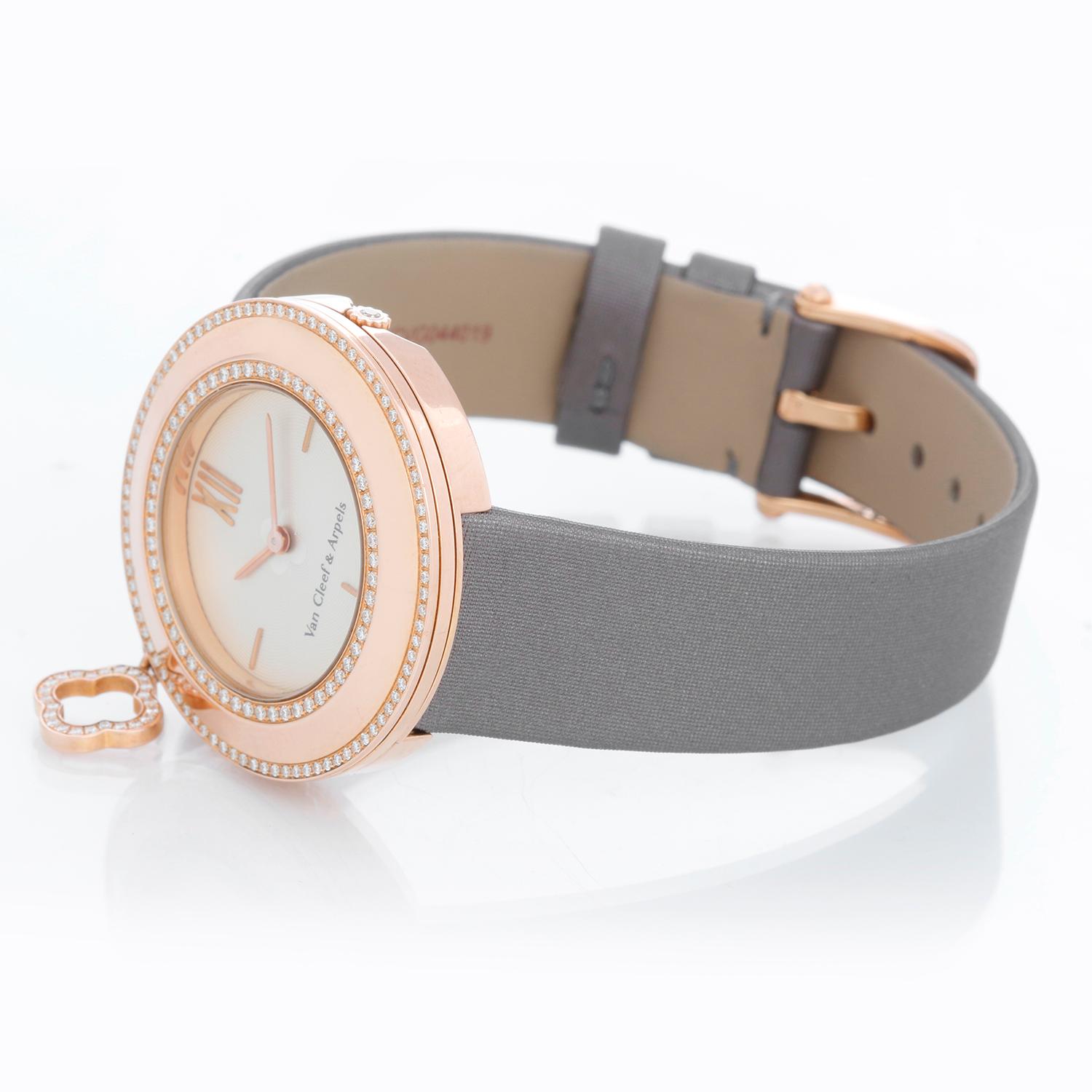 Van Cleef & Arpels Charms 18K Rose Gold Diamond Watch VCARM95000 - Quartz. 18K Rose gold case ( 32 mm ) with two rows of diamonds; small Alhambra charm with diamonds on the side. Guilloche white dial with raised 18K Rose gold numerals. Brand new Van