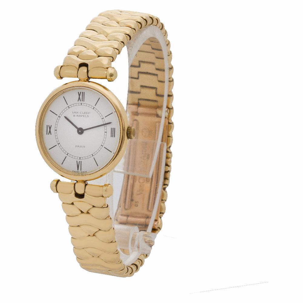 Timeless Ladies Van Cleef & Arpels Classic in 18k yellow gold. Quartz. 24 mm case size. Ref 18601cc1. Circa 1990s. Fine Pre-owned Van Cleef & Arpels Watch. Certified preowned Vintage Van Cleef & Arpels Classic 18601cc1 watch is made out of yellow
