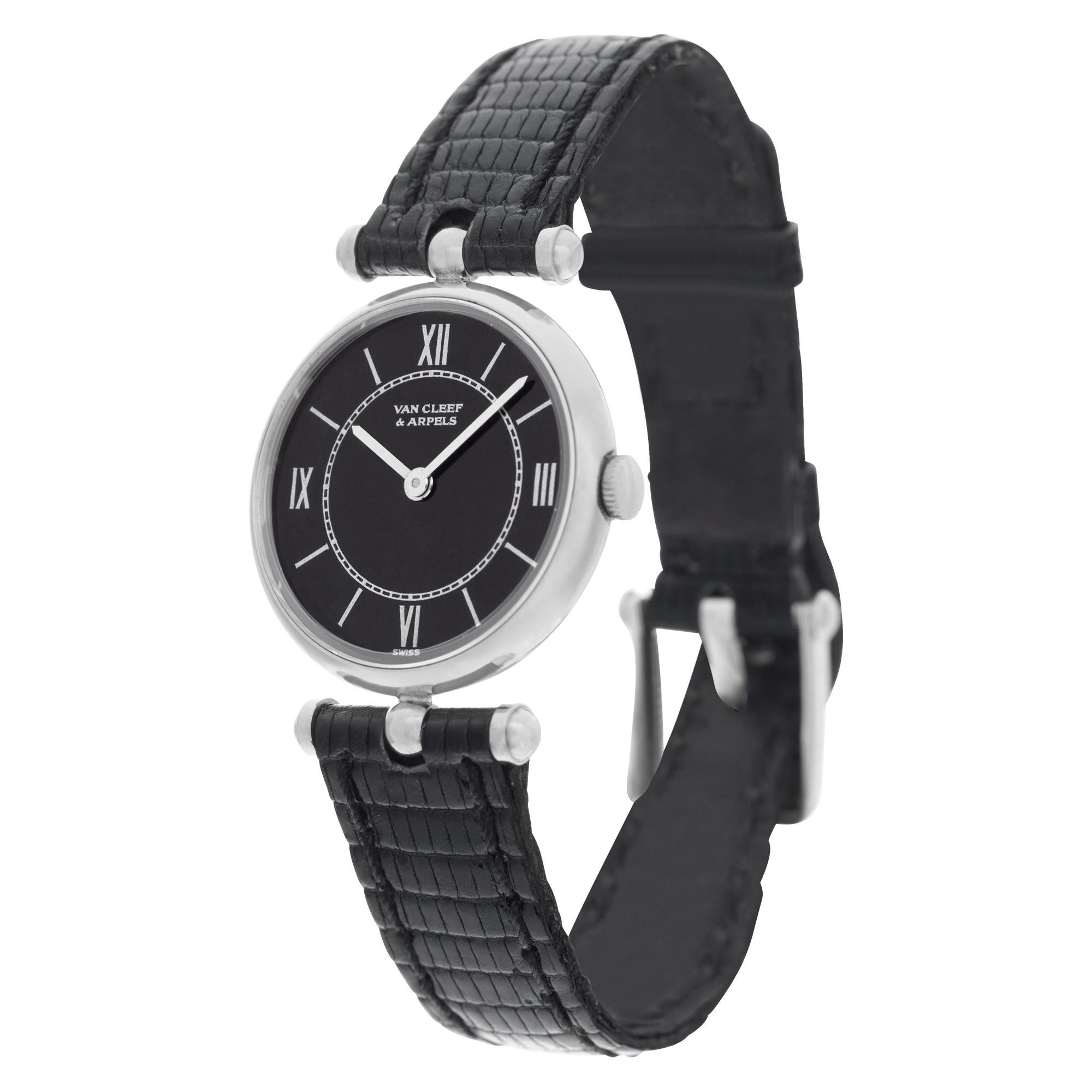 Van Cleef & Arpels Classic in 18k white gold on a black lizard strap with 18k white gold tang buckle. Manual wind.. 24 mm case size. Comes with original VCA pouch. Ref 31601. Circa 1990s. Fine Pre-owned Van Cleef & Arpels Watch.

Certified preowned