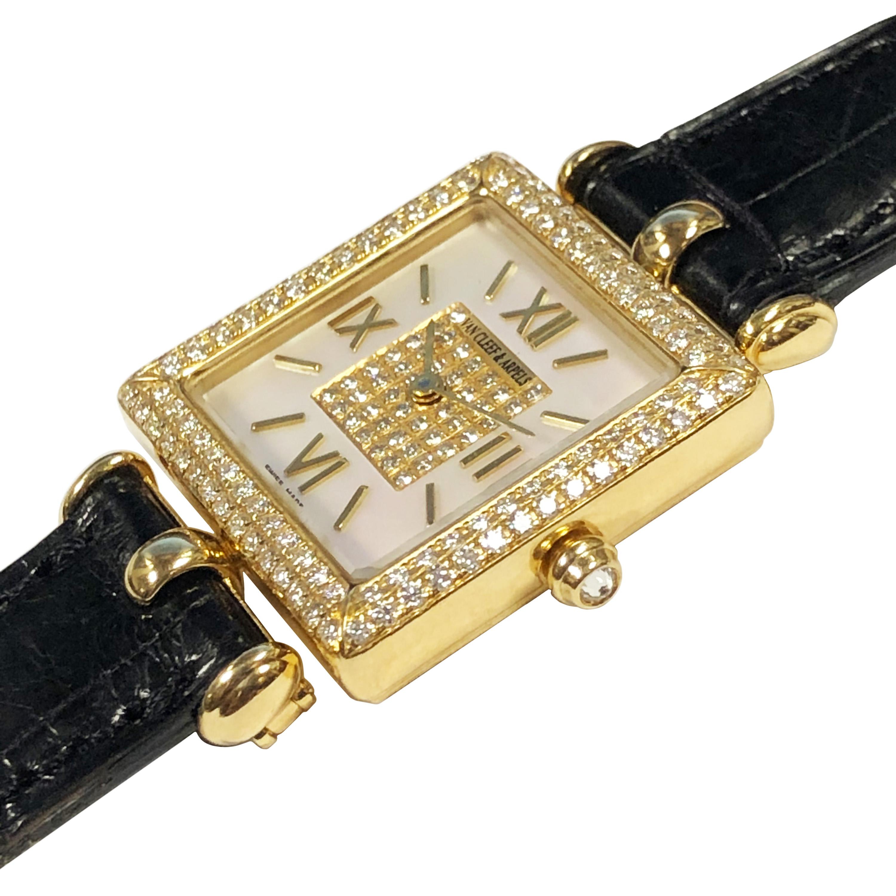 Circa 2010 Van Cleef & Arpels Classique Ladies Wrist Watch, 23 X 23 MM 2 piece 18K Yellow Gold case, Double row Diamond set bezel totaling 1.20 Carats, Diamond set Crown, quartz movement, Mother of Pearl dial with raised Gold Markers and the center