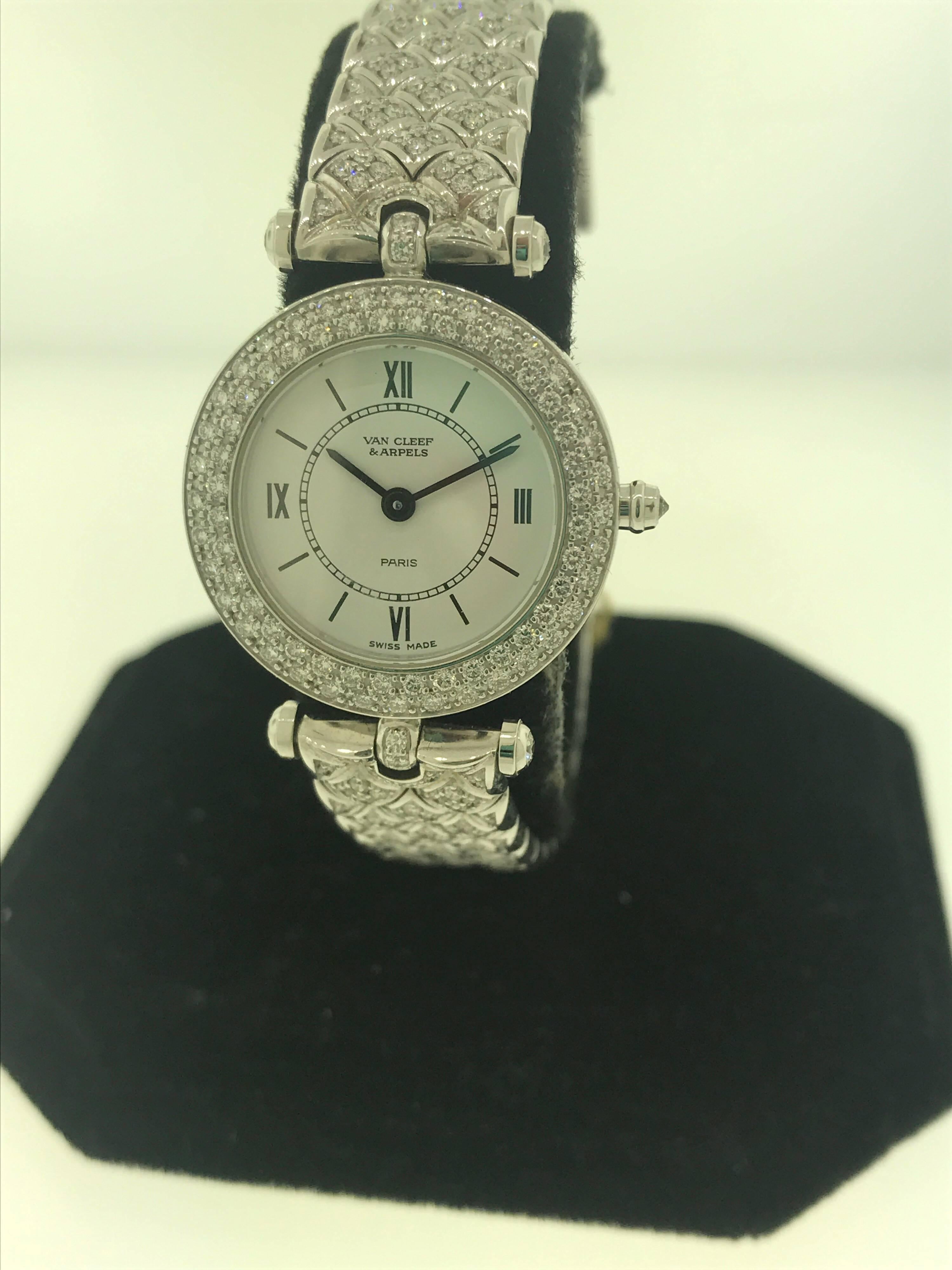Van Cleef & Arpels Classique Ladies Watch

Model Number: 322632 B2

100% Authentic

Pre owned restored to be in perfectly working & pristine condition

Comes with a generic watch box

18 Karat White Gold Case & Bracelet

Bezel set with 2 rows of